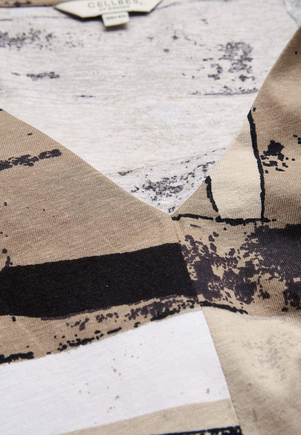 Hihaton trikootoppi v-pääntiellä