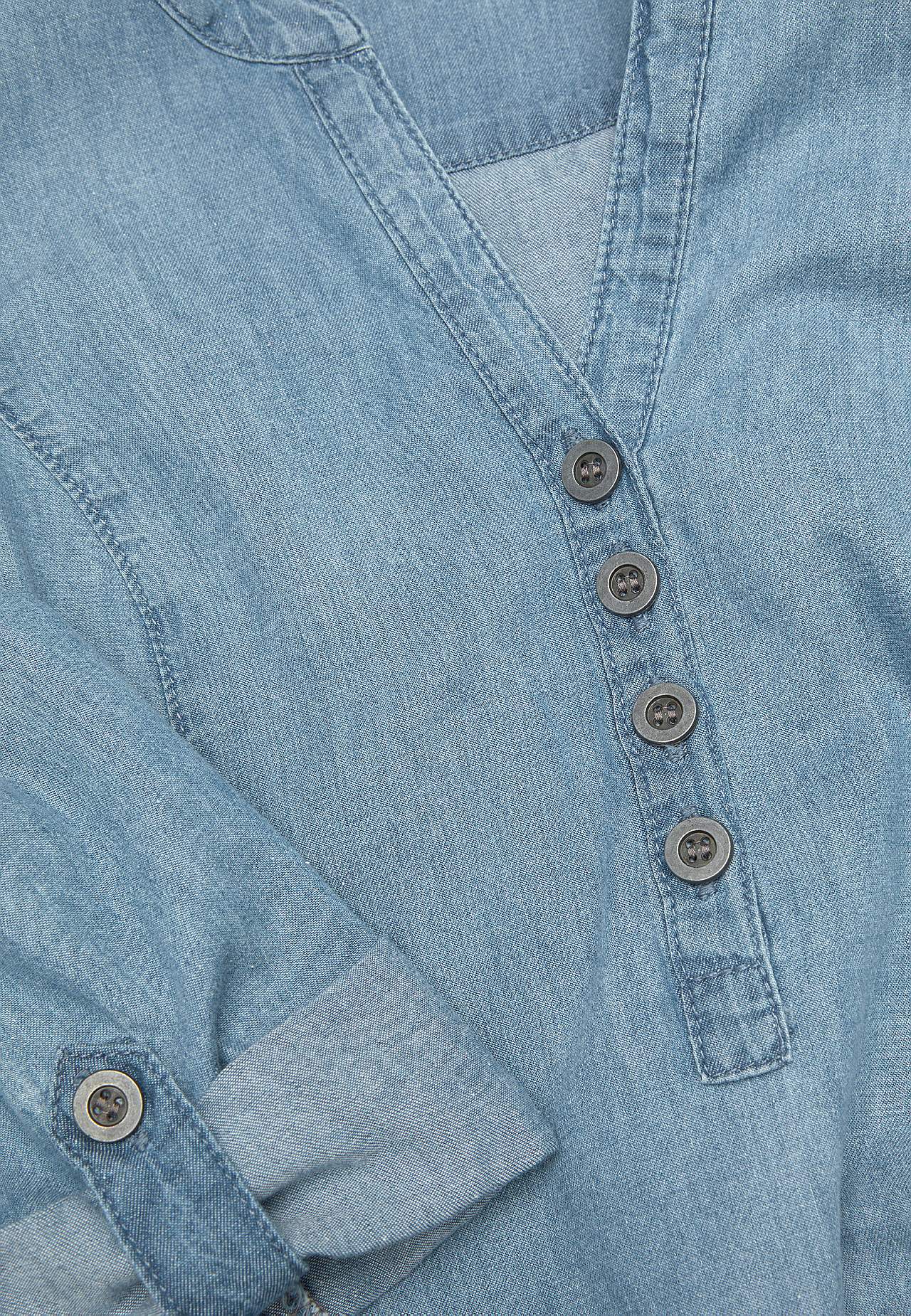 Denimtunika taskuilla