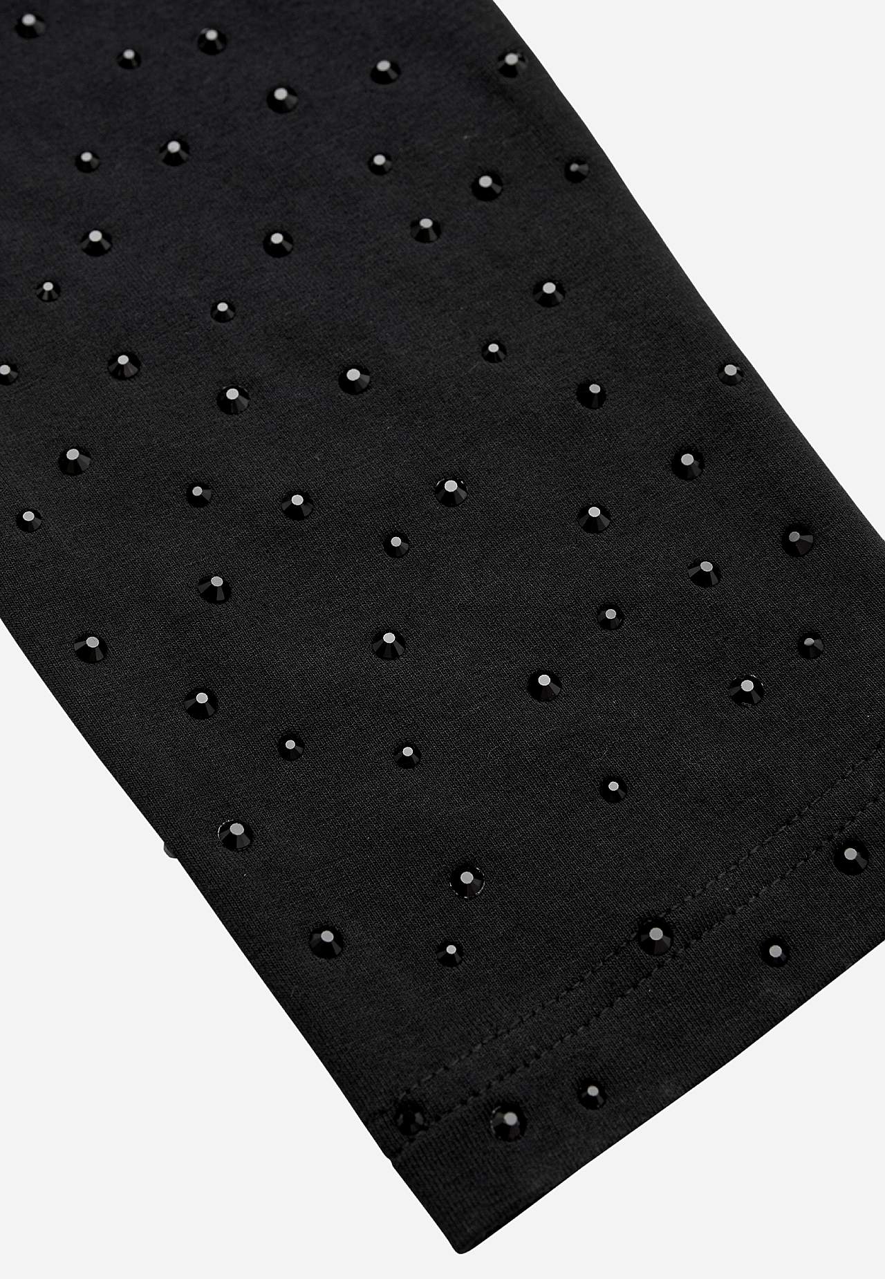 Leggingsit glitterisillä yksityiskohdilla