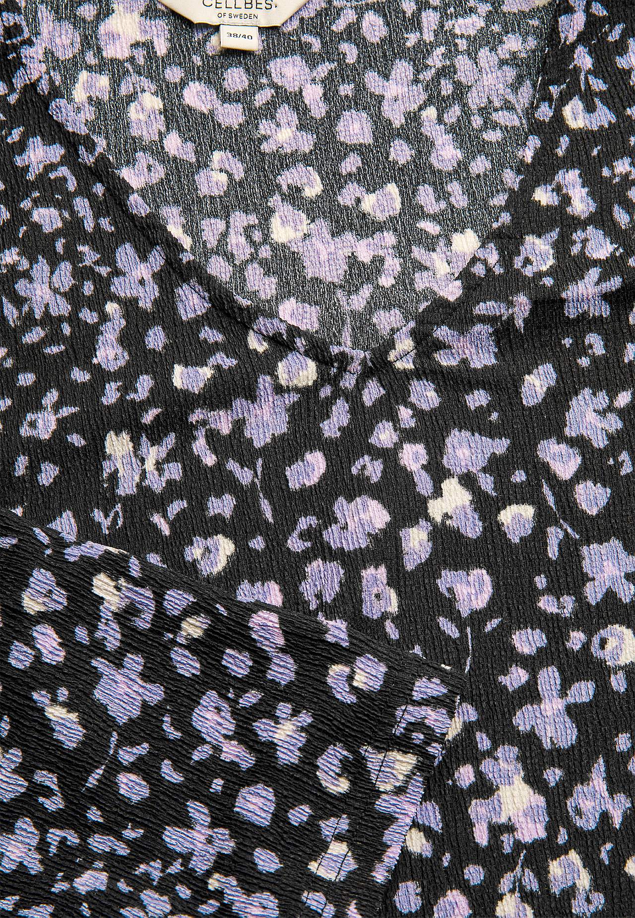 Trikootoppi sommitelmalla