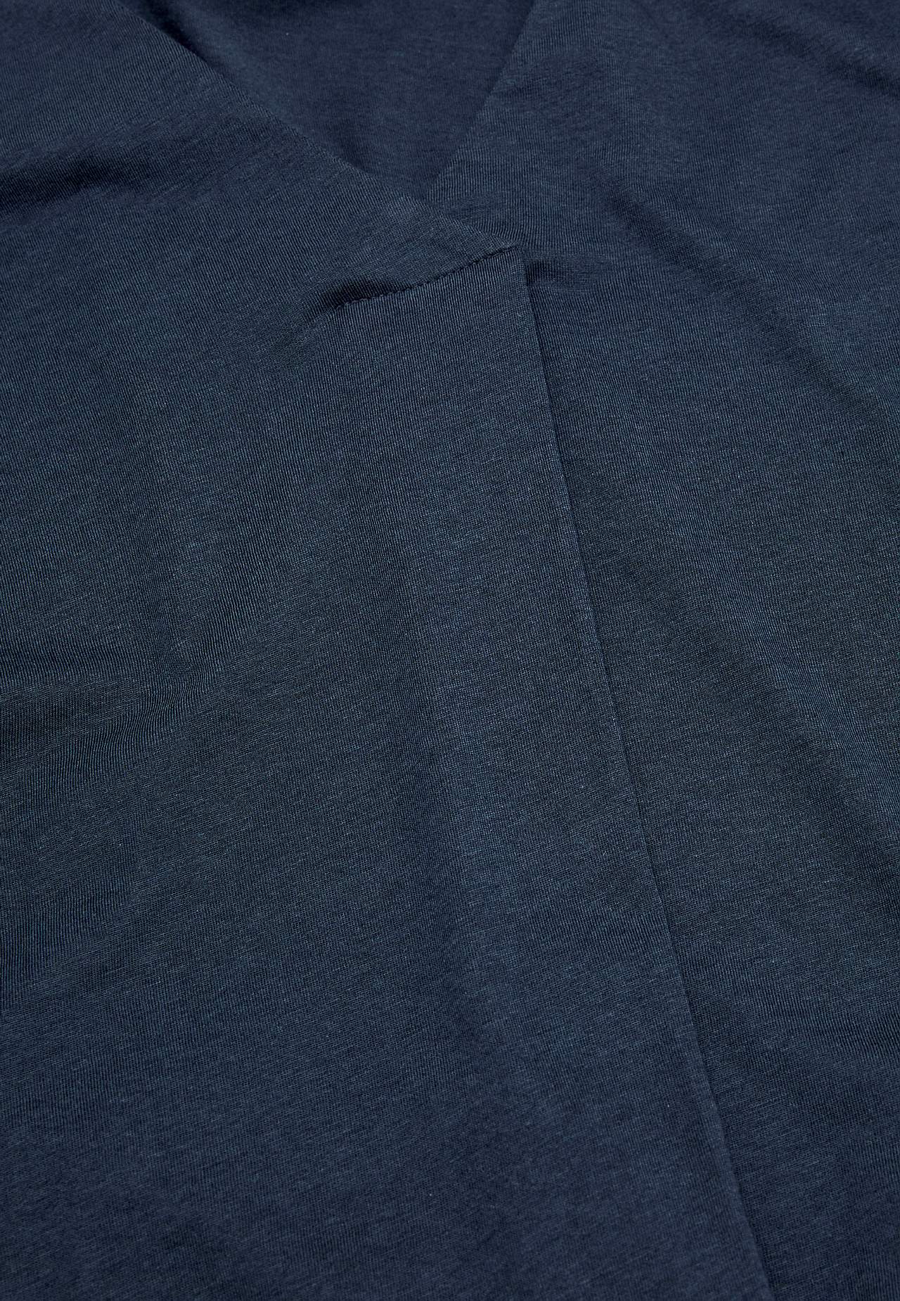Trikootunika laskosdetaljilla