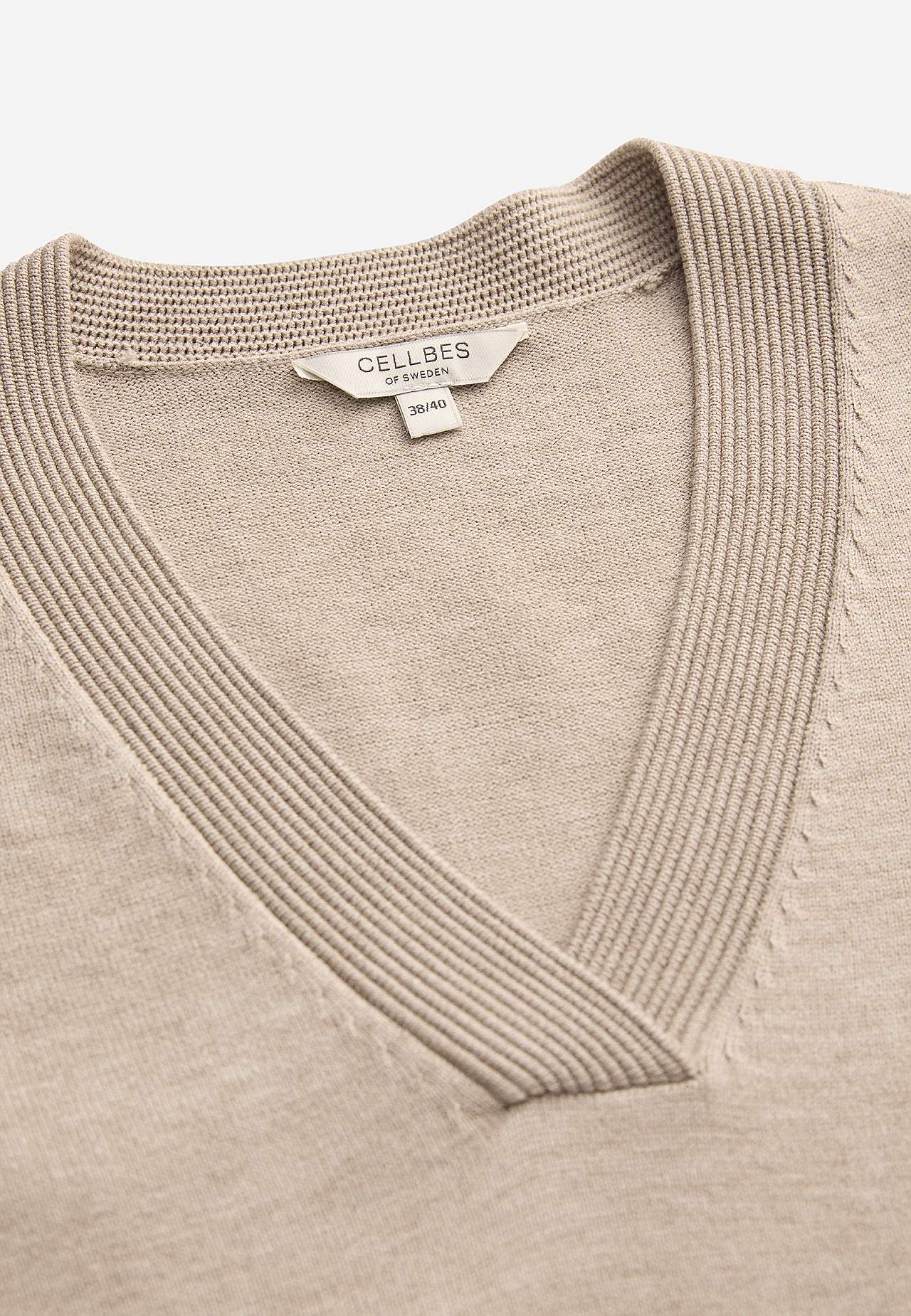 Tiheäsilmukkainen tunika