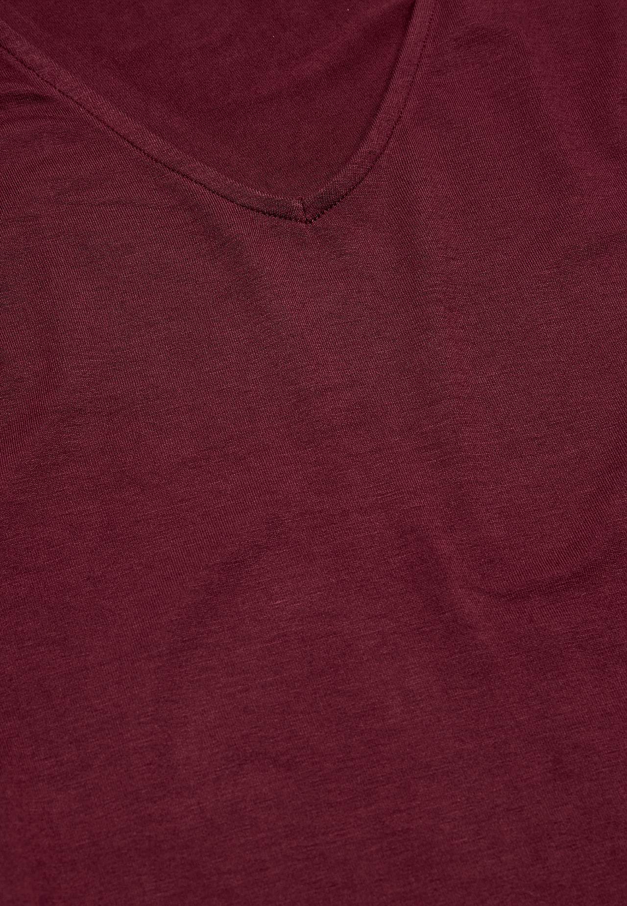 Trikootoppi röyhelöhihoilla