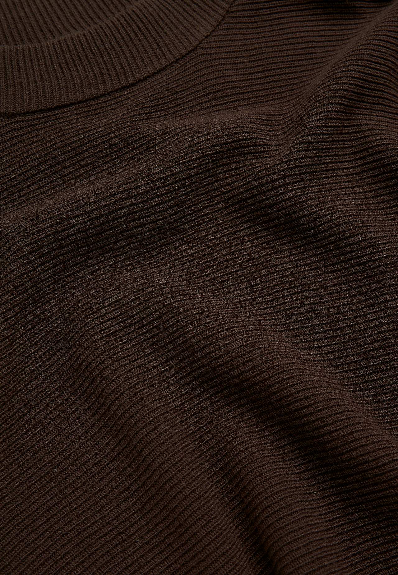 Tiheäsilmukkainen poncho