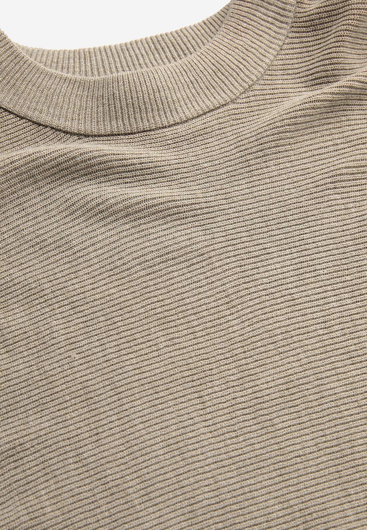 Tiheäsilmukkainen poncho
