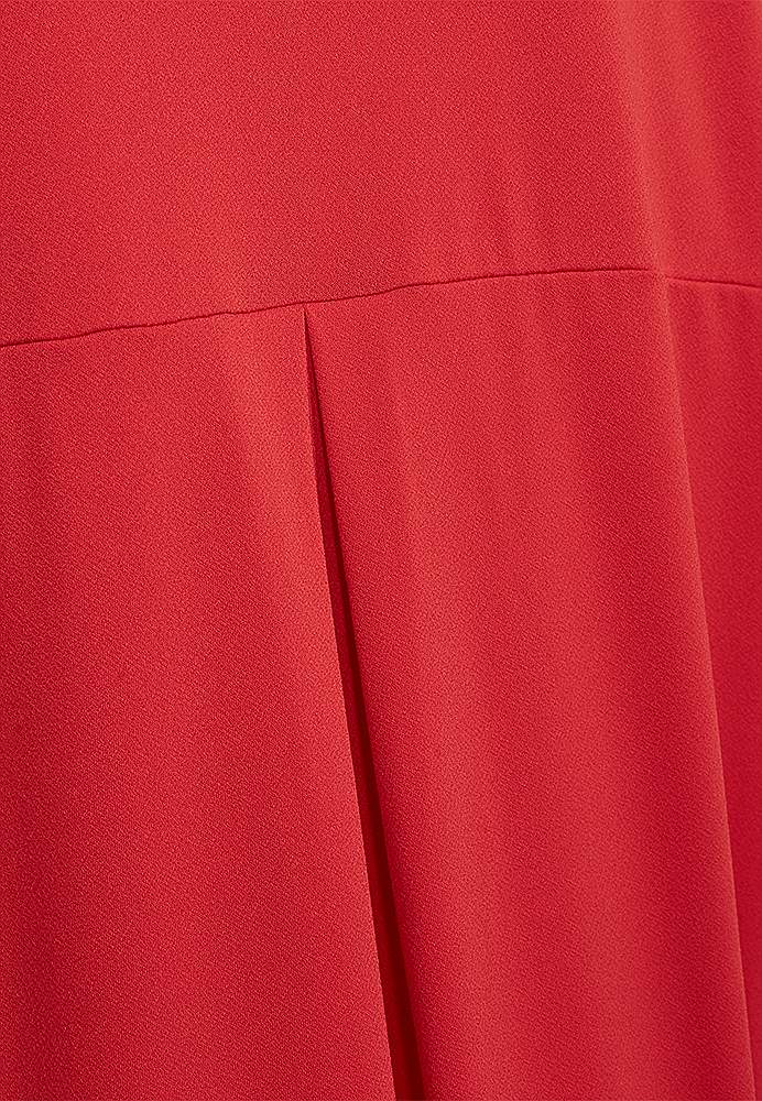 Trikoomekko taskuilla