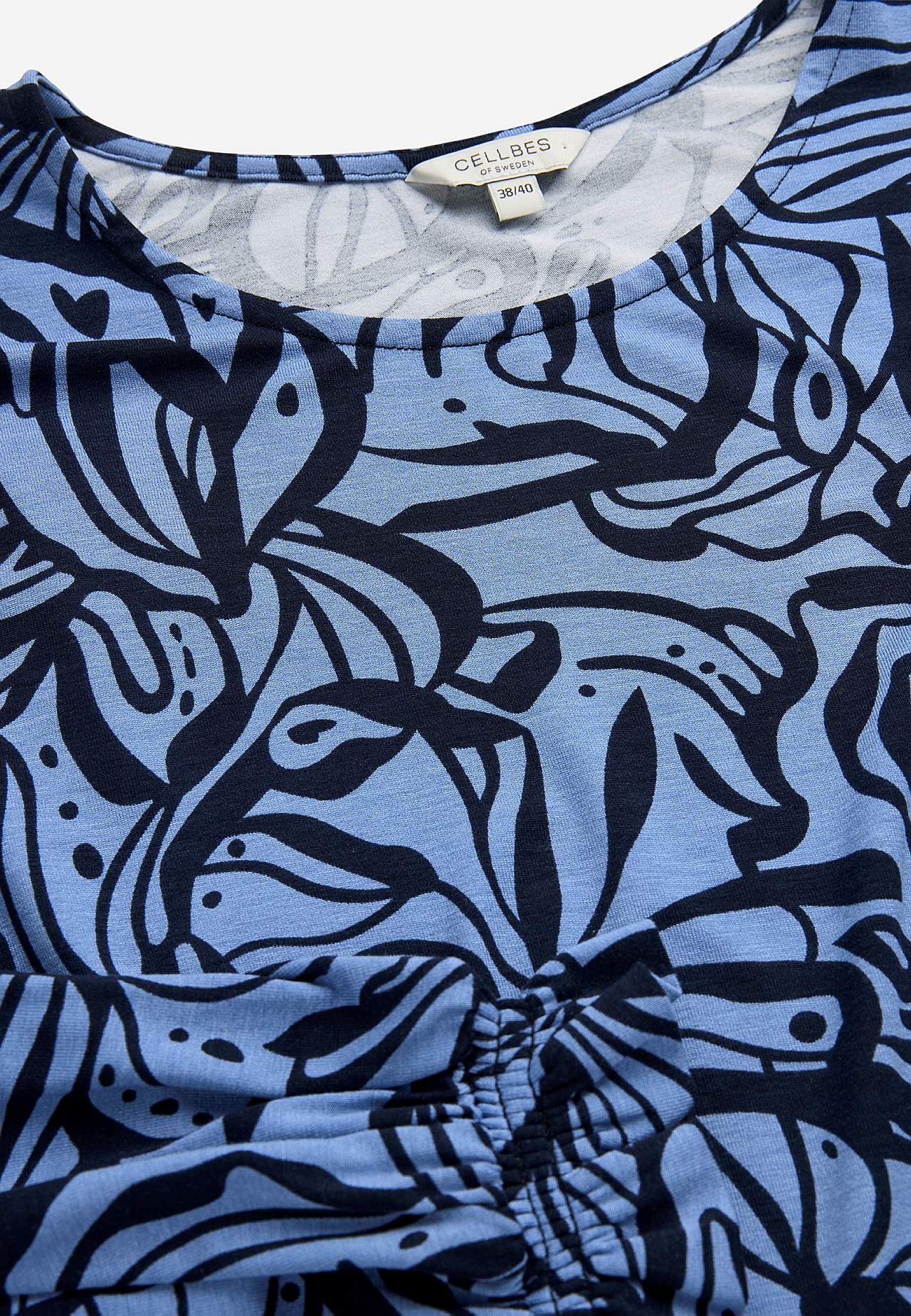 Trikootunika smokkidetaljilla