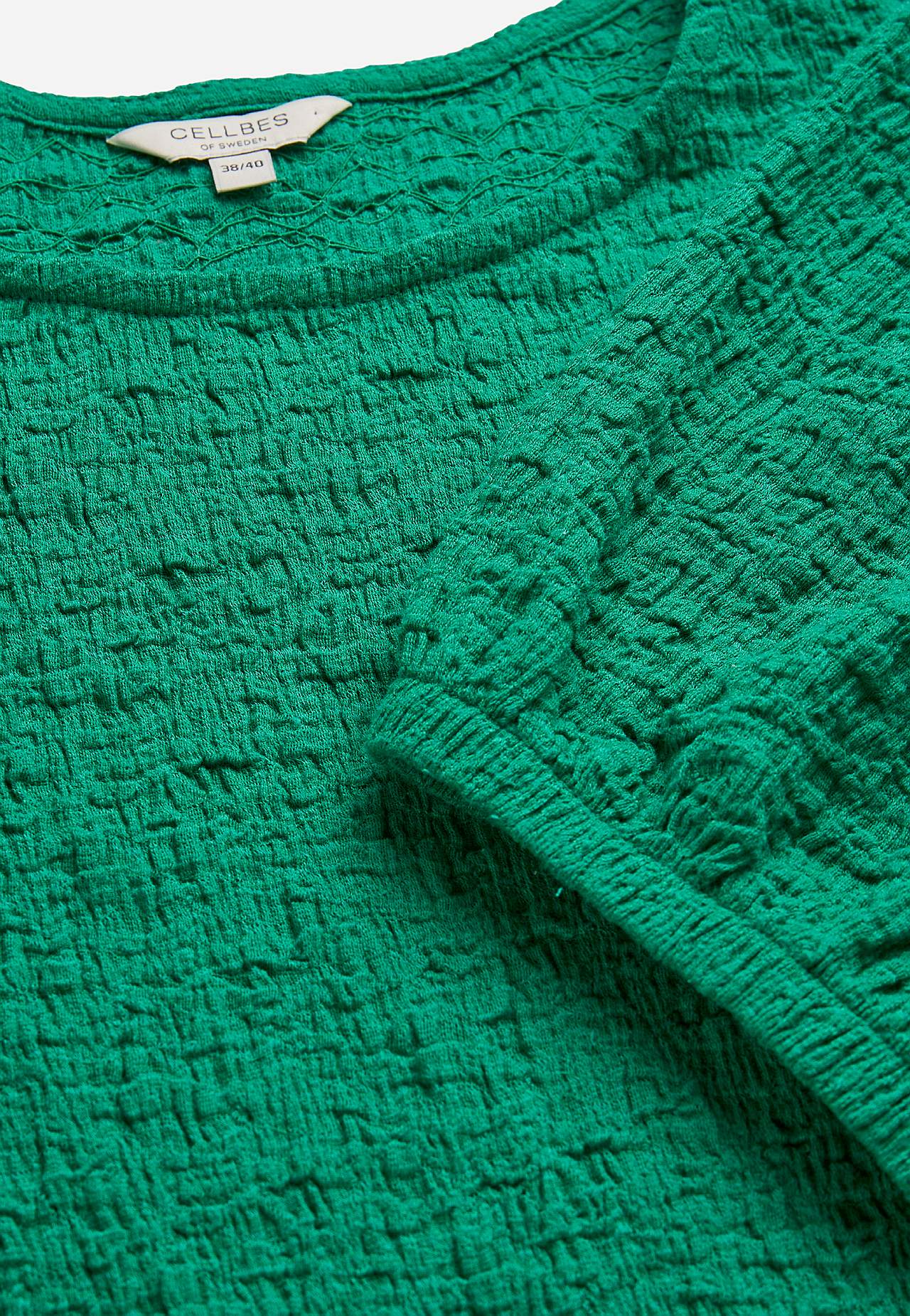 Trikootoppi rakenteella