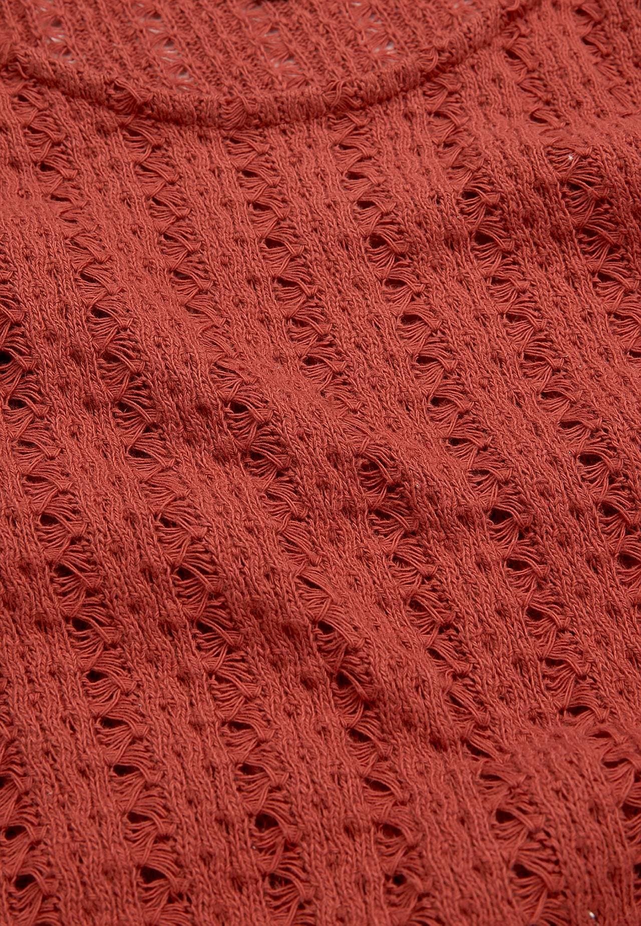 Trikootoppi rei’ityksellä