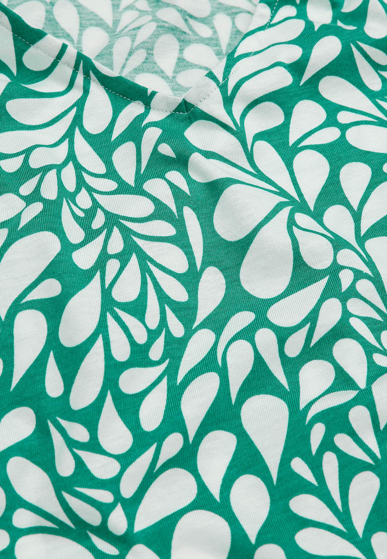 Trikootoppi lyhyillä hihoilla