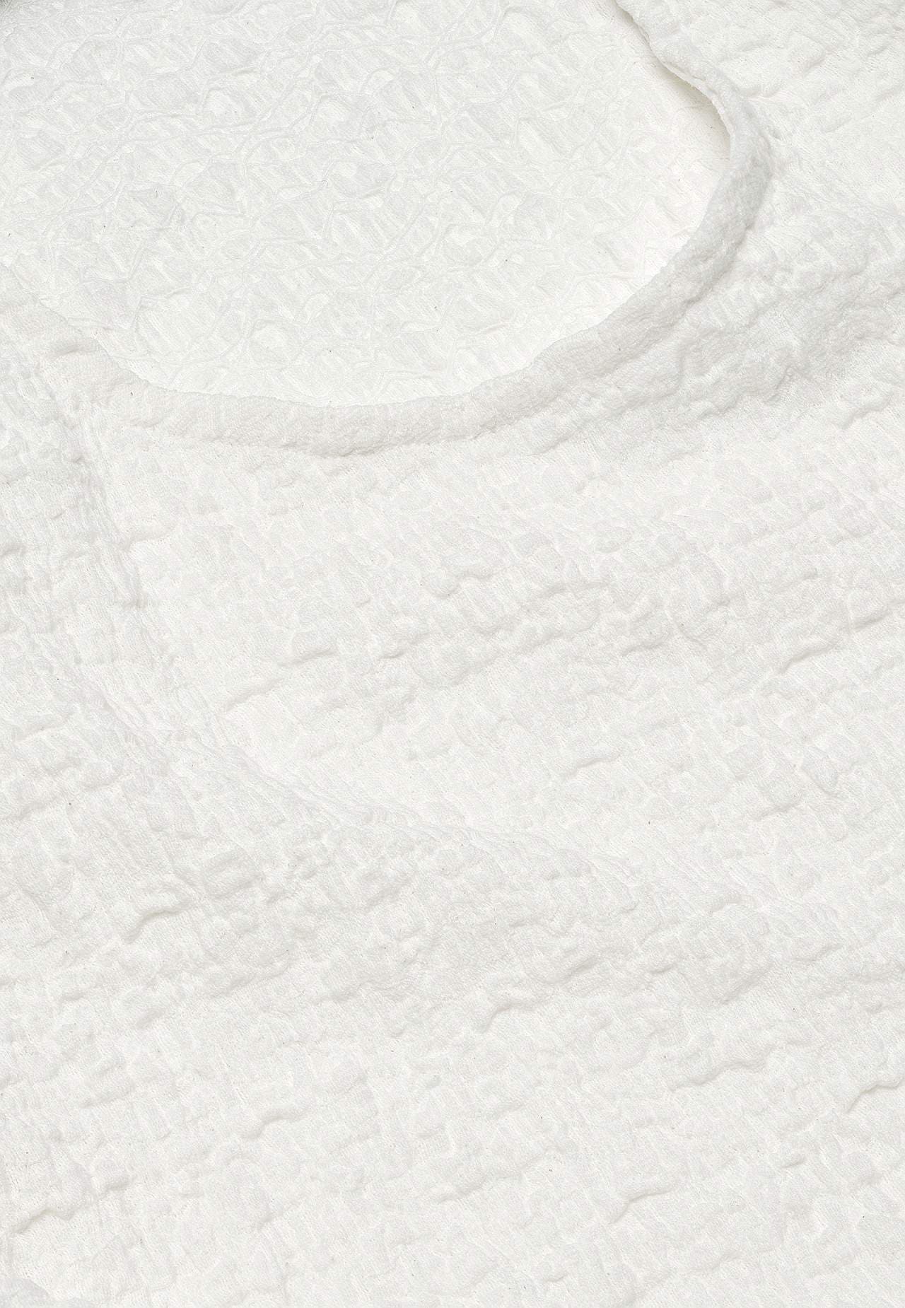 Trikootoppi rakenteella