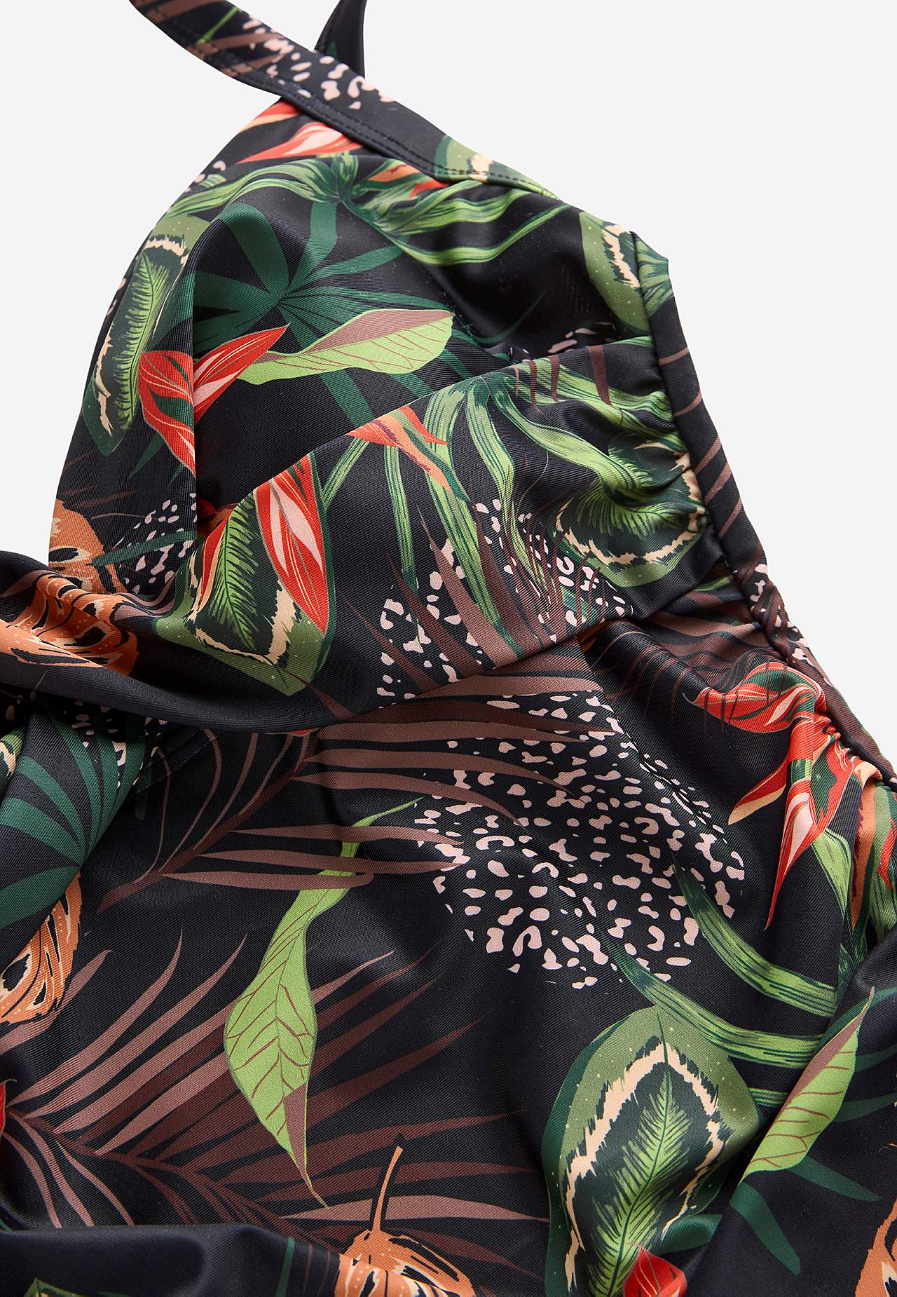 Kuvioitu muotoileva uima-asu