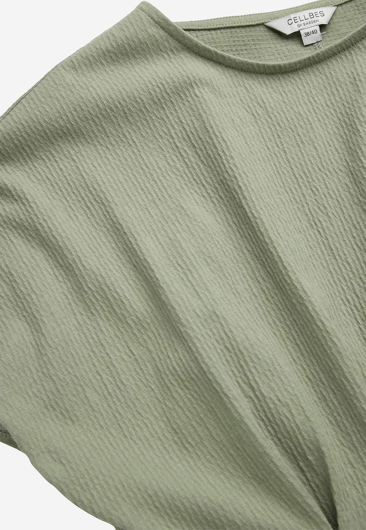 Mekko rypytetystä puuvillajersey-kankaasta