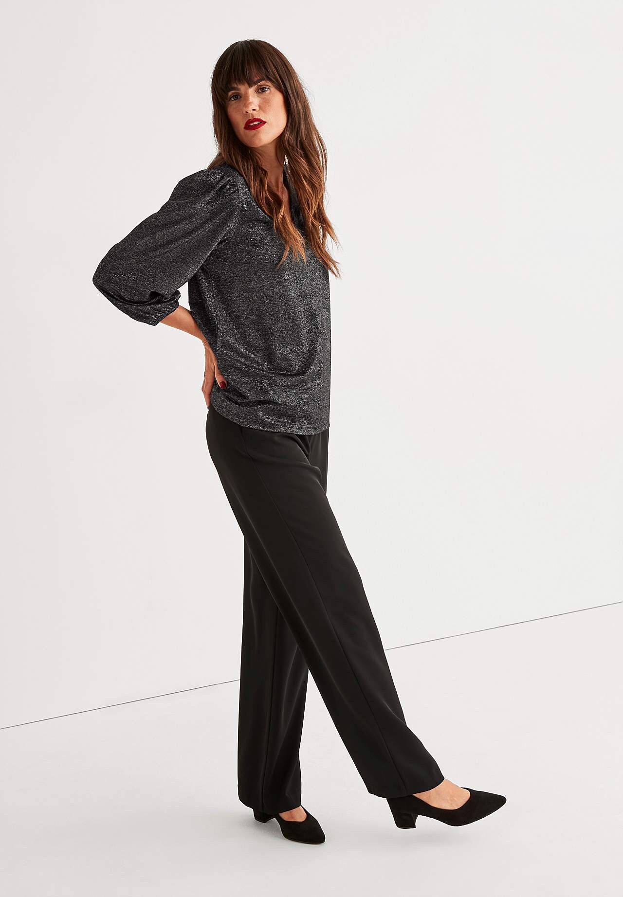 Kimalteleva trikootoppi