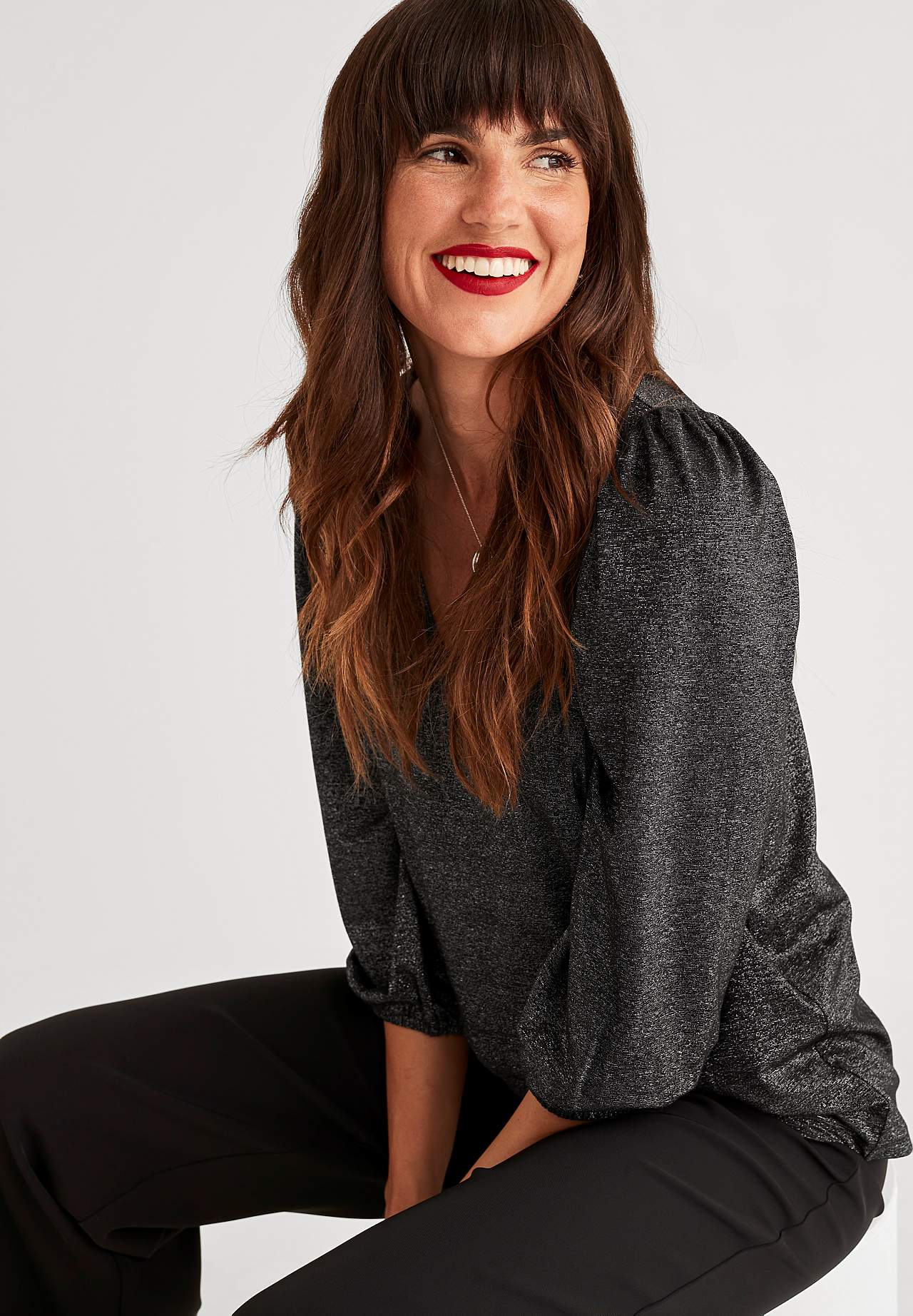 Kimalteleva trikootoppi