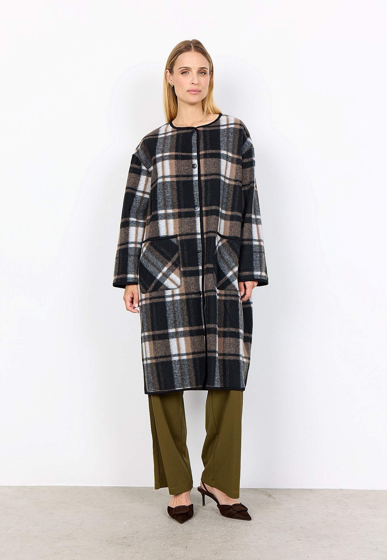 Huovutettu, ruudullinen takki