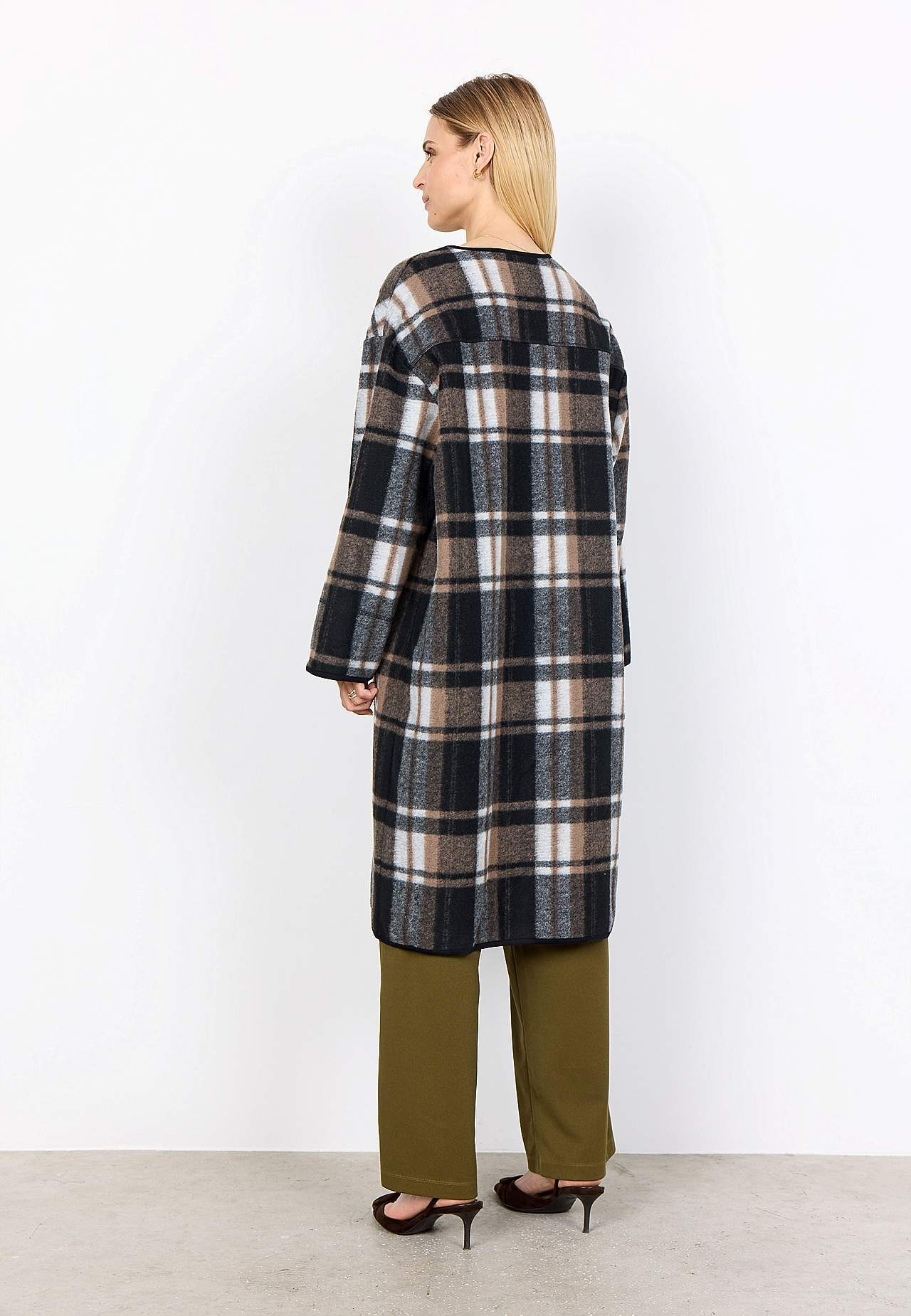 Huovutettu, ruudullinen takki