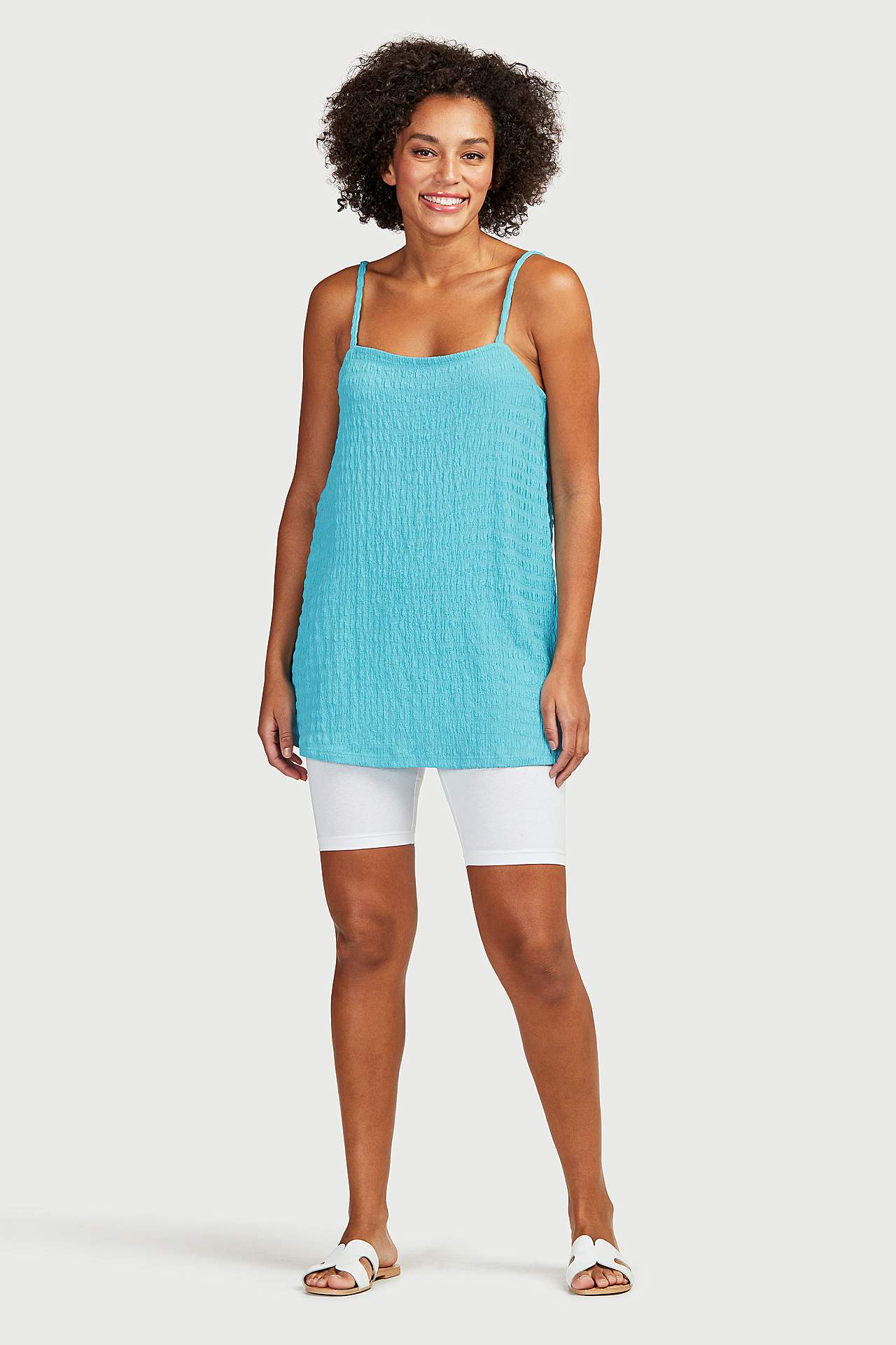 Pitkä trikootoppi ohuilla olkaimilla