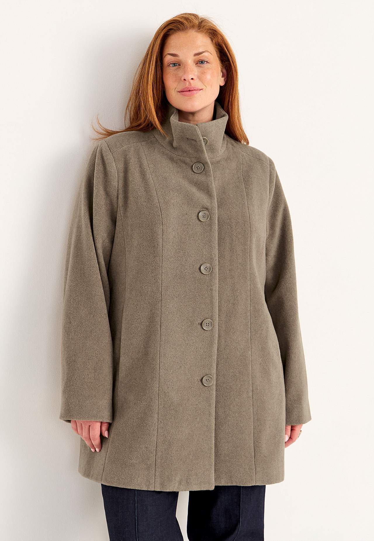 Takki pystykauluksella