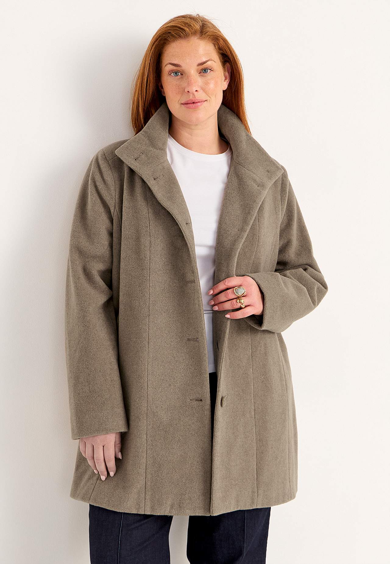 Takki pystykauluksella