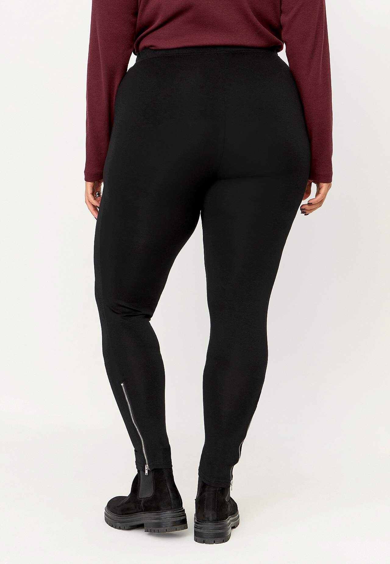 Leggingsit vetoketjuilla