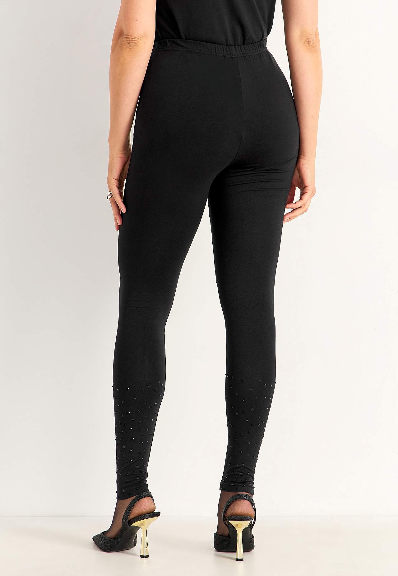 Leggingsit glitterisillä yksityiskohdilla