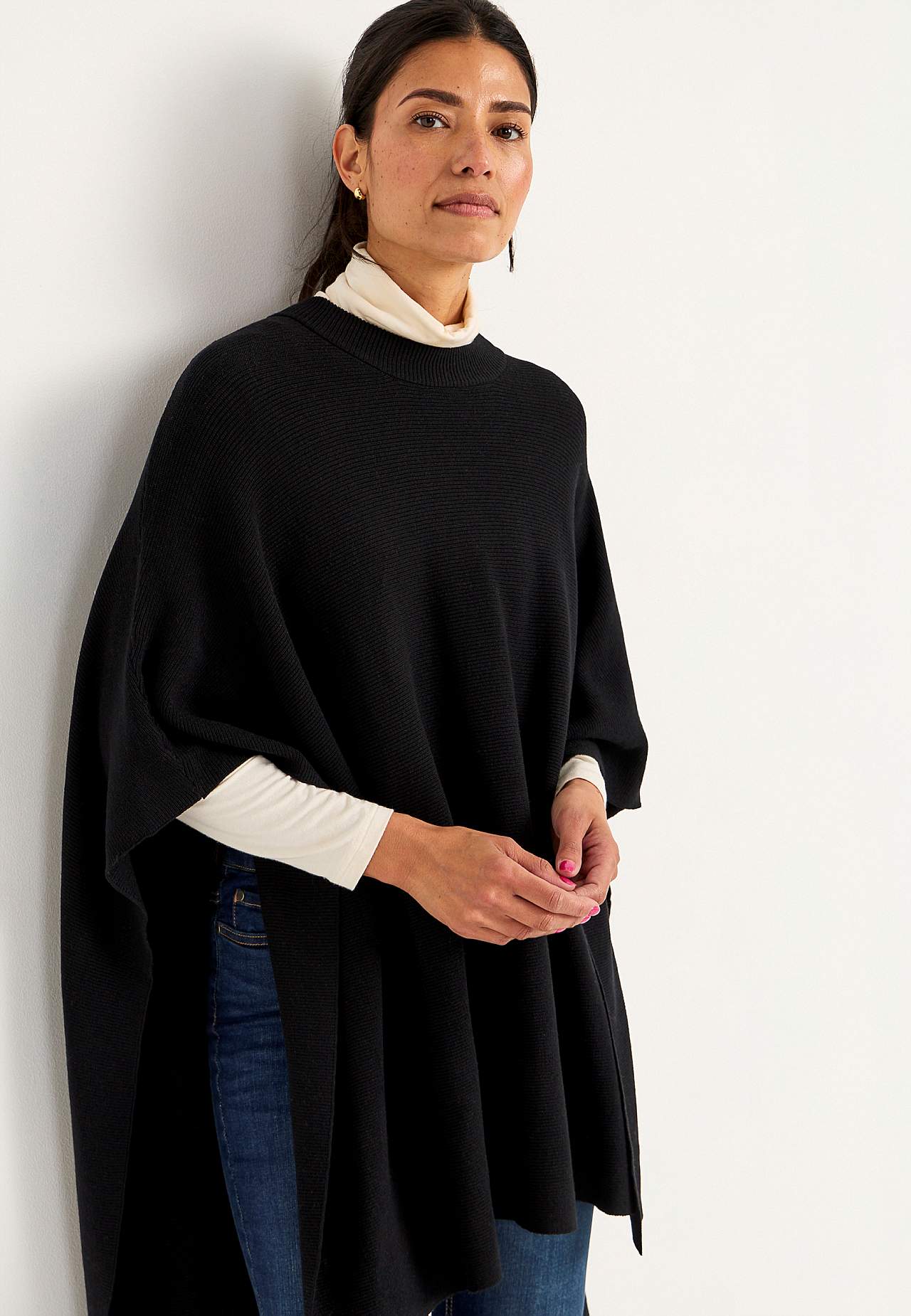 Tiheäsilmukkainen poncho