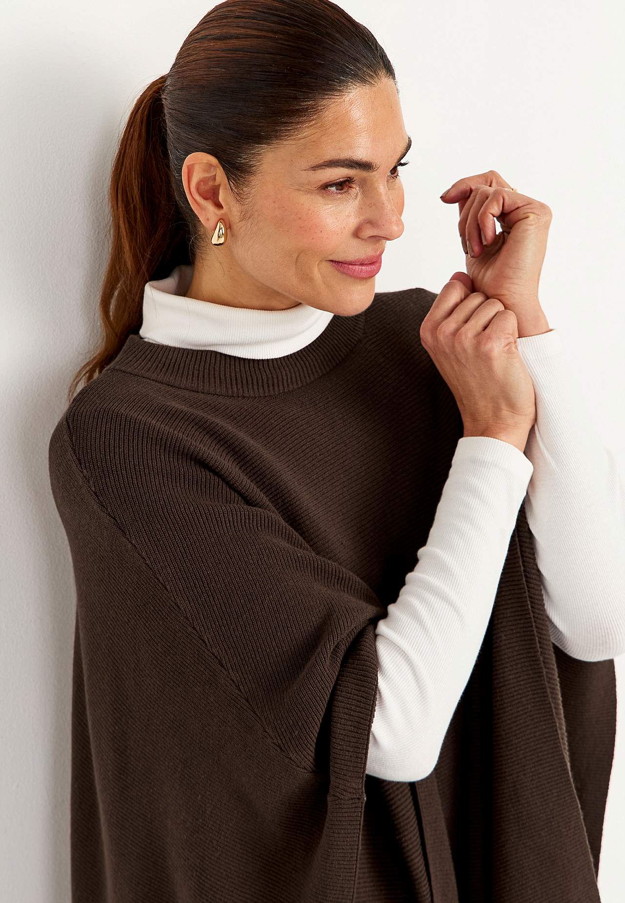Tiheäsilmukkainen poncho