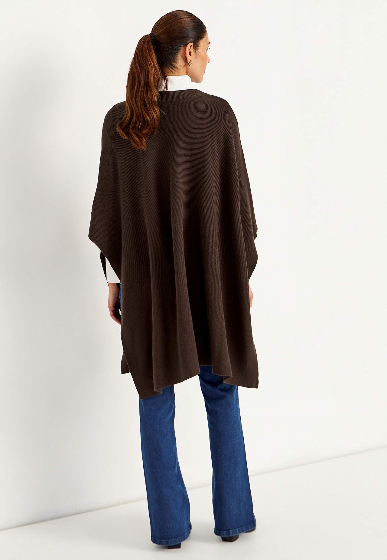 Tiheäsilmukkainen poncho