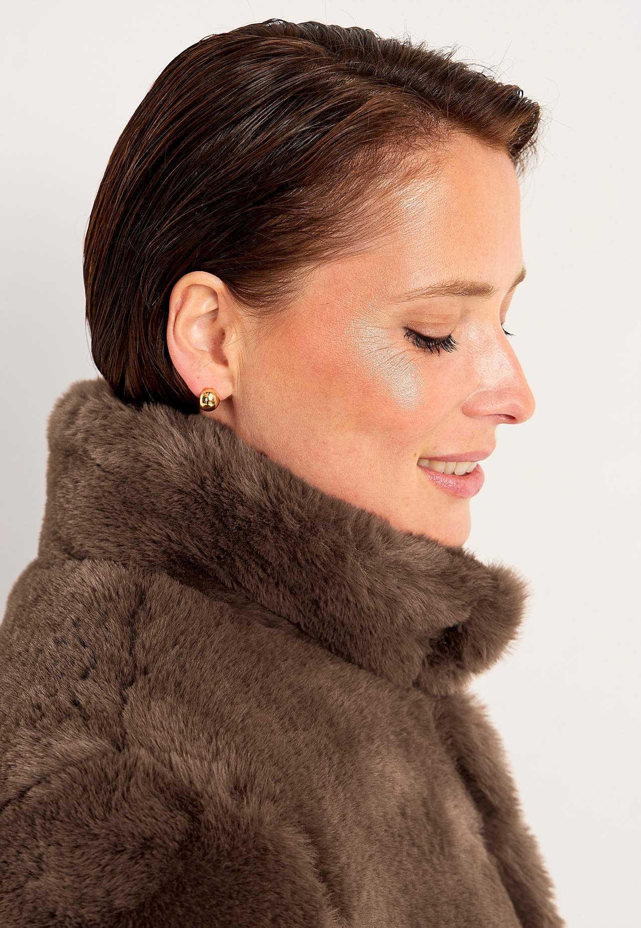 Takki pehmeällä tekoturkiksella