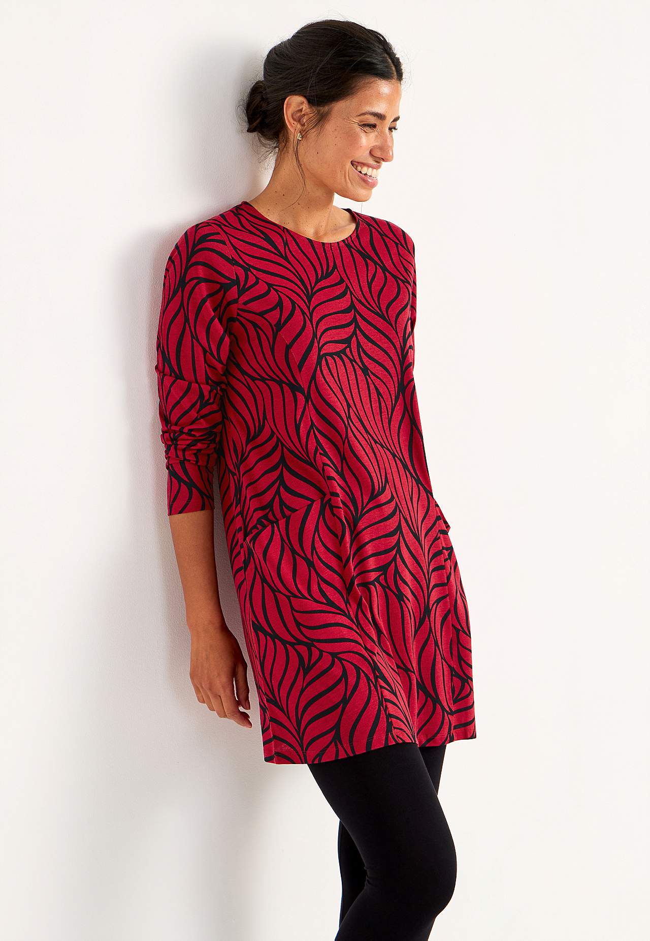 Trikootunika taskuilla