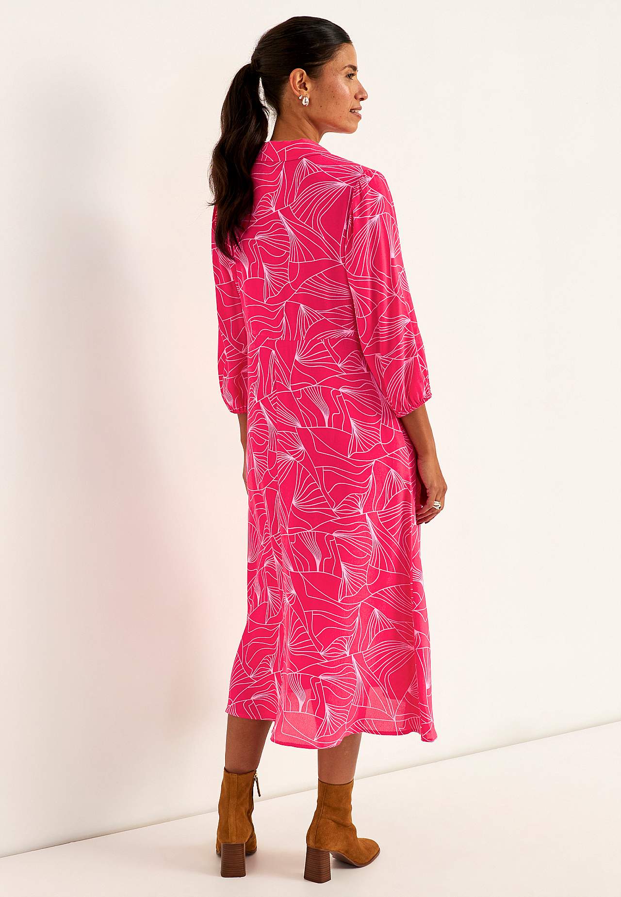 Kudottu mekko taskuilla