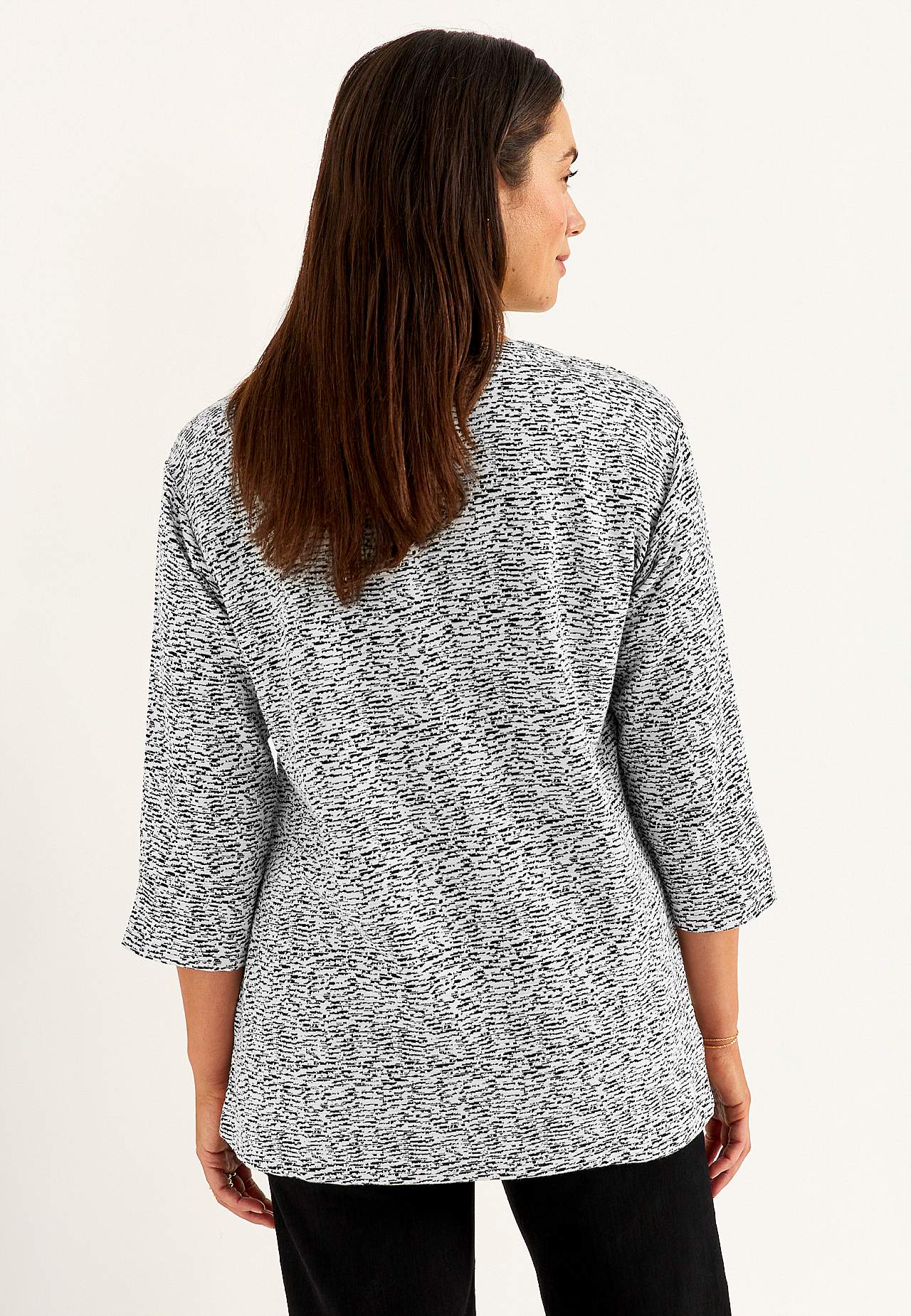 Trikootunika halkioilla