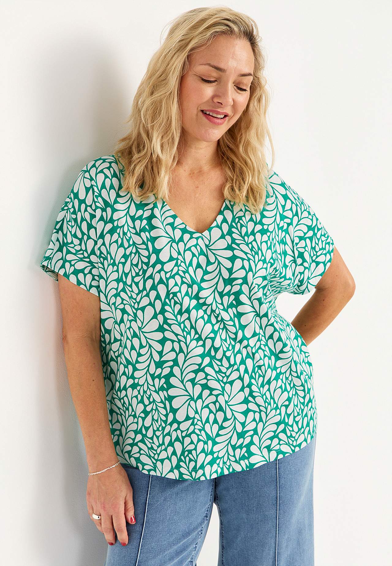 Trikootoppi lyhyillä hihoilla