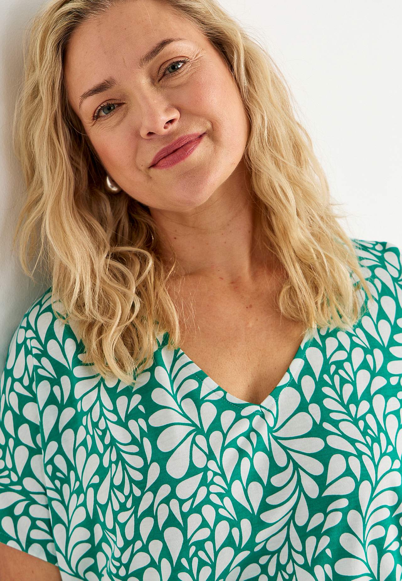 Trikootoppi lyhyillä hihoilla