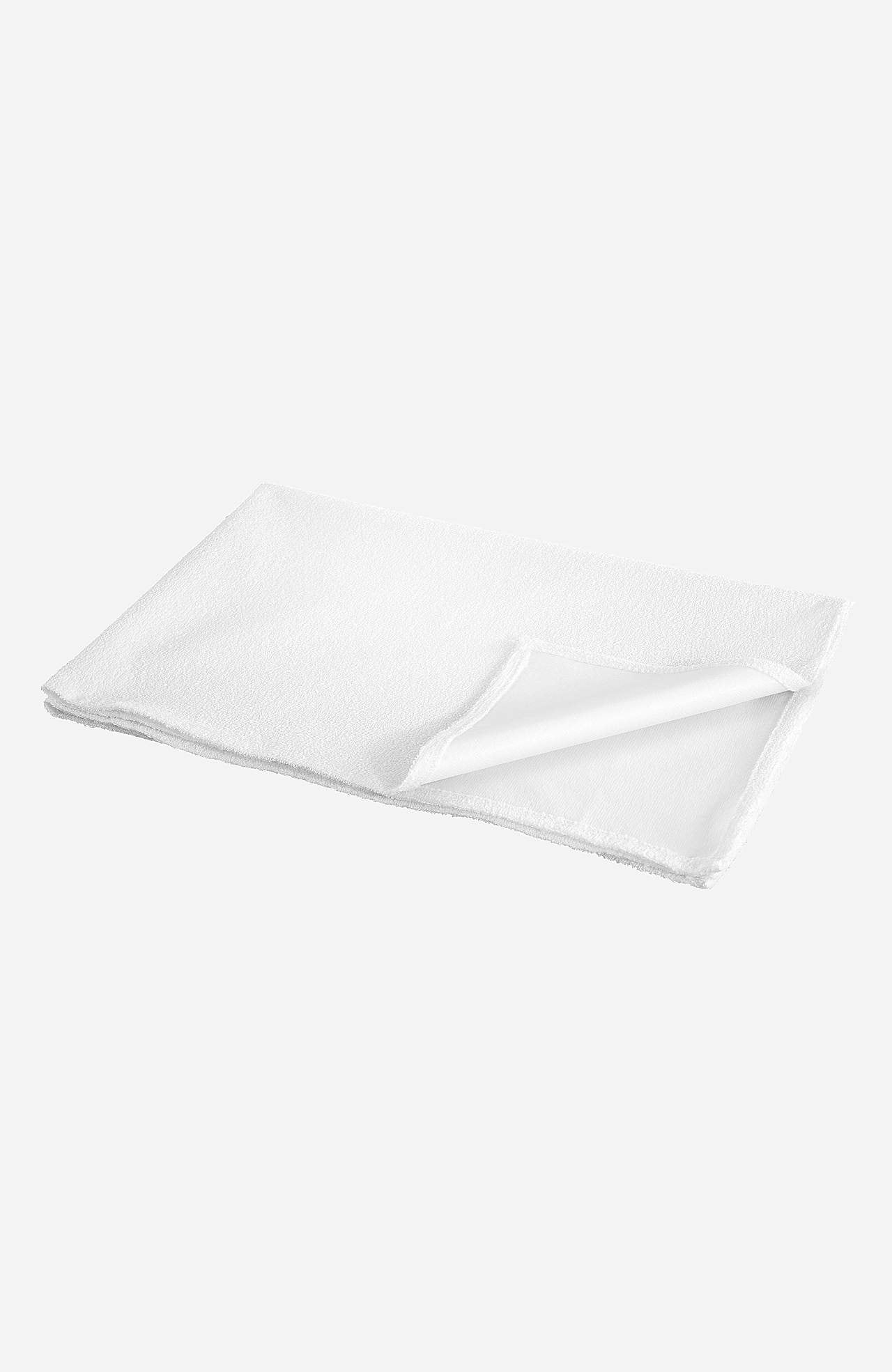 Patjasuoja muovipinnoitetusta froteesta