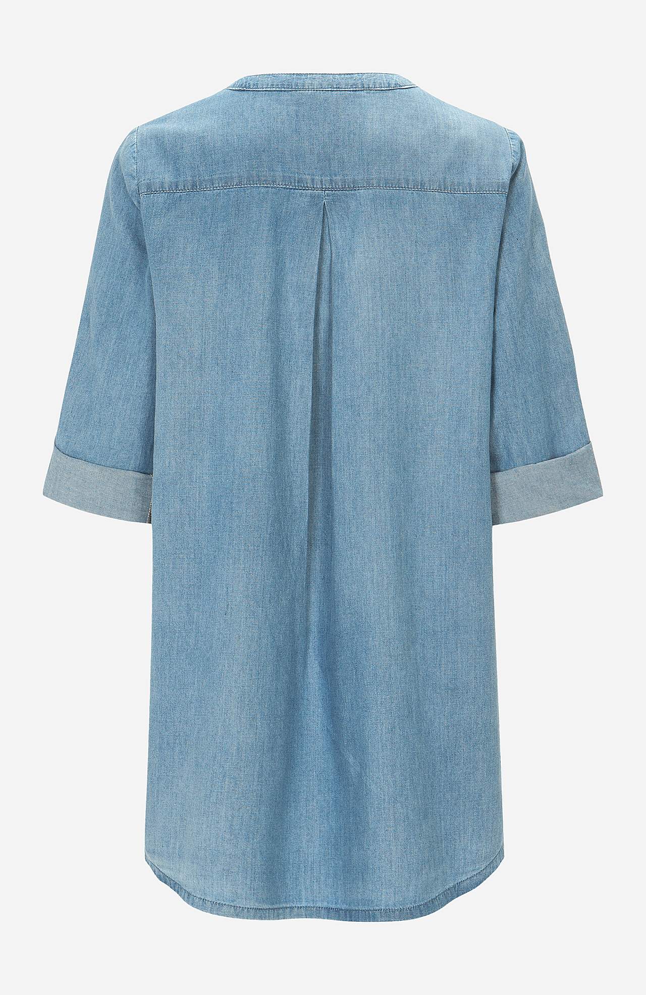 Denimtunika taskuilla