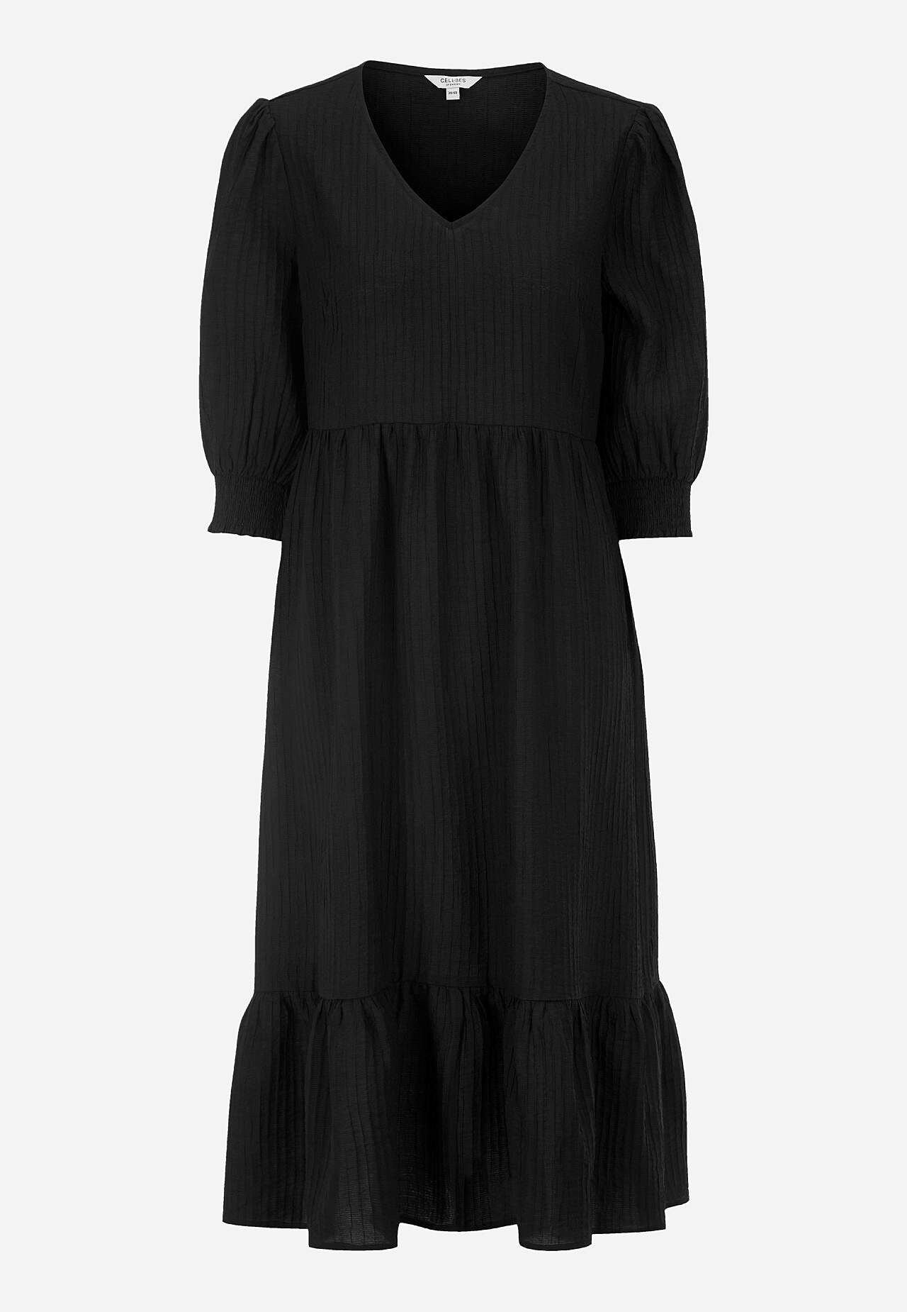 Kudottu mekko röyhelöllä