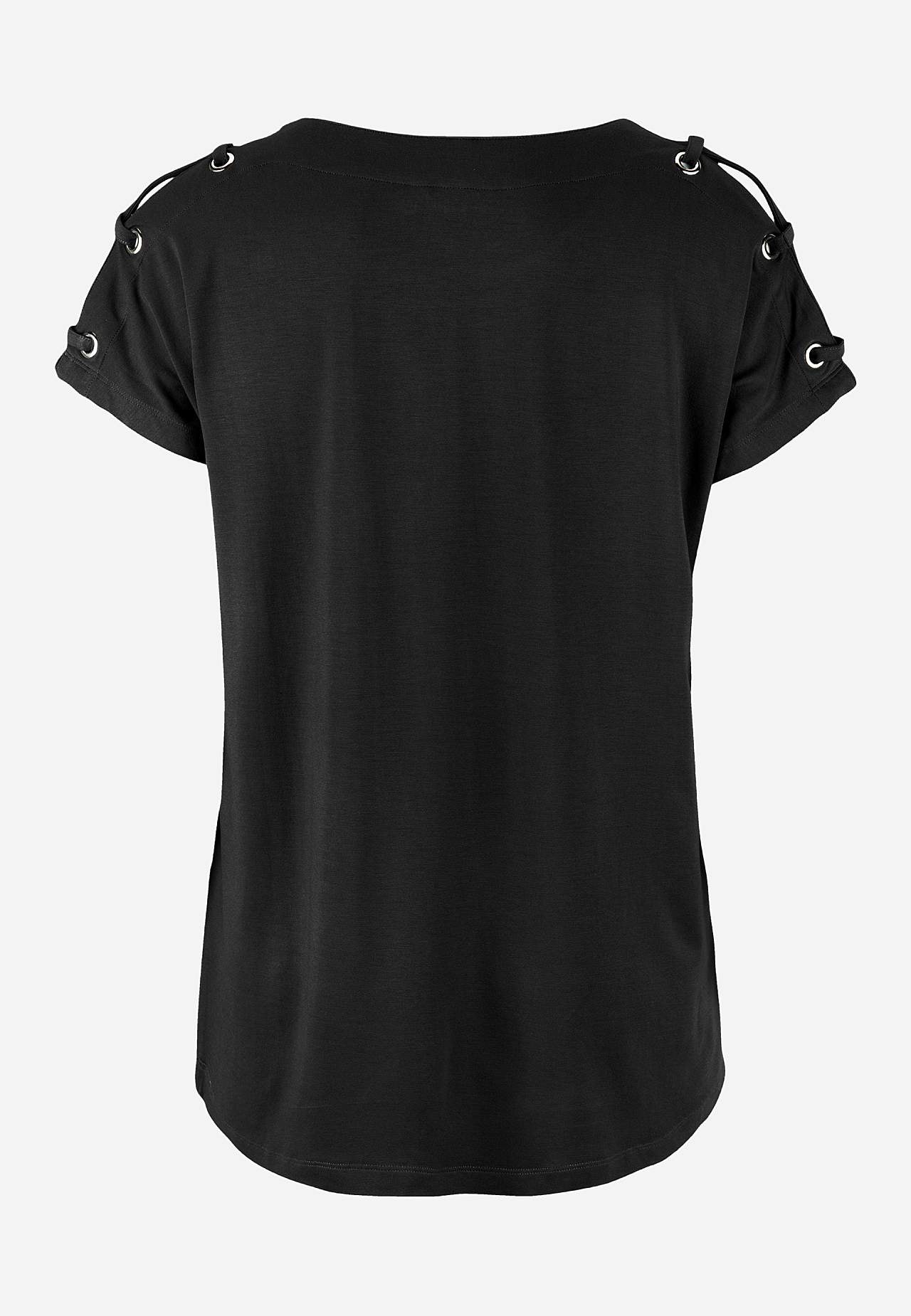 Trikootoppi sisustuksella olkapäässä