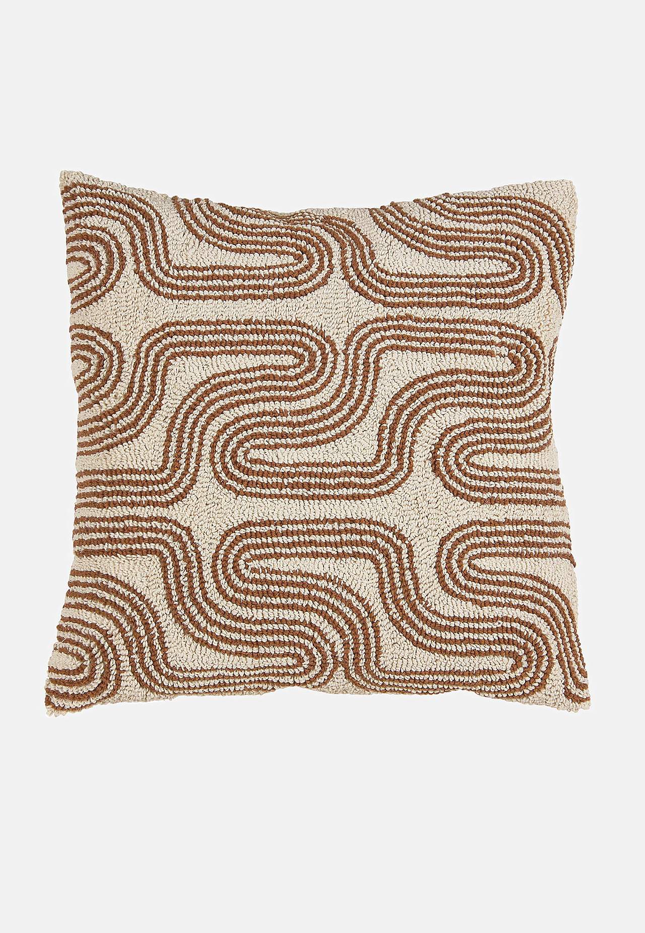 Tyynynpäällinen tupsukoristeisella kuvioinnilla