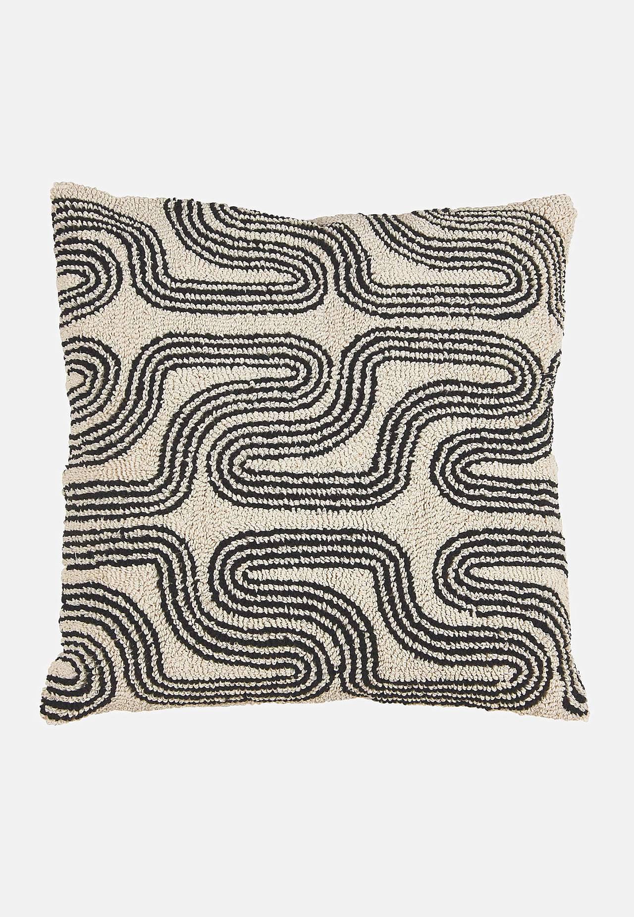 Tyynynpäällinen tupsukoristeisella kuvioinnilla