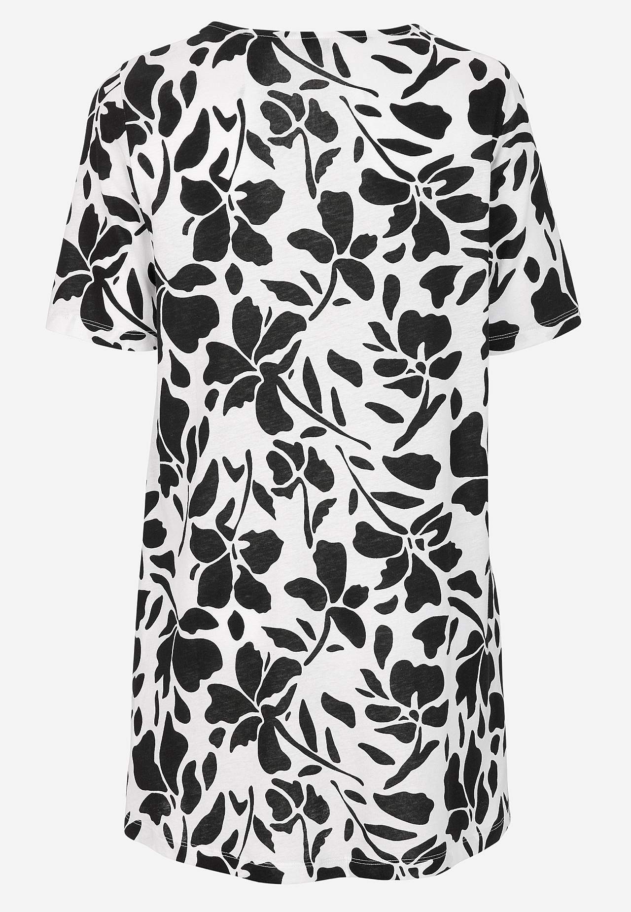 Trikootunika taskuilla