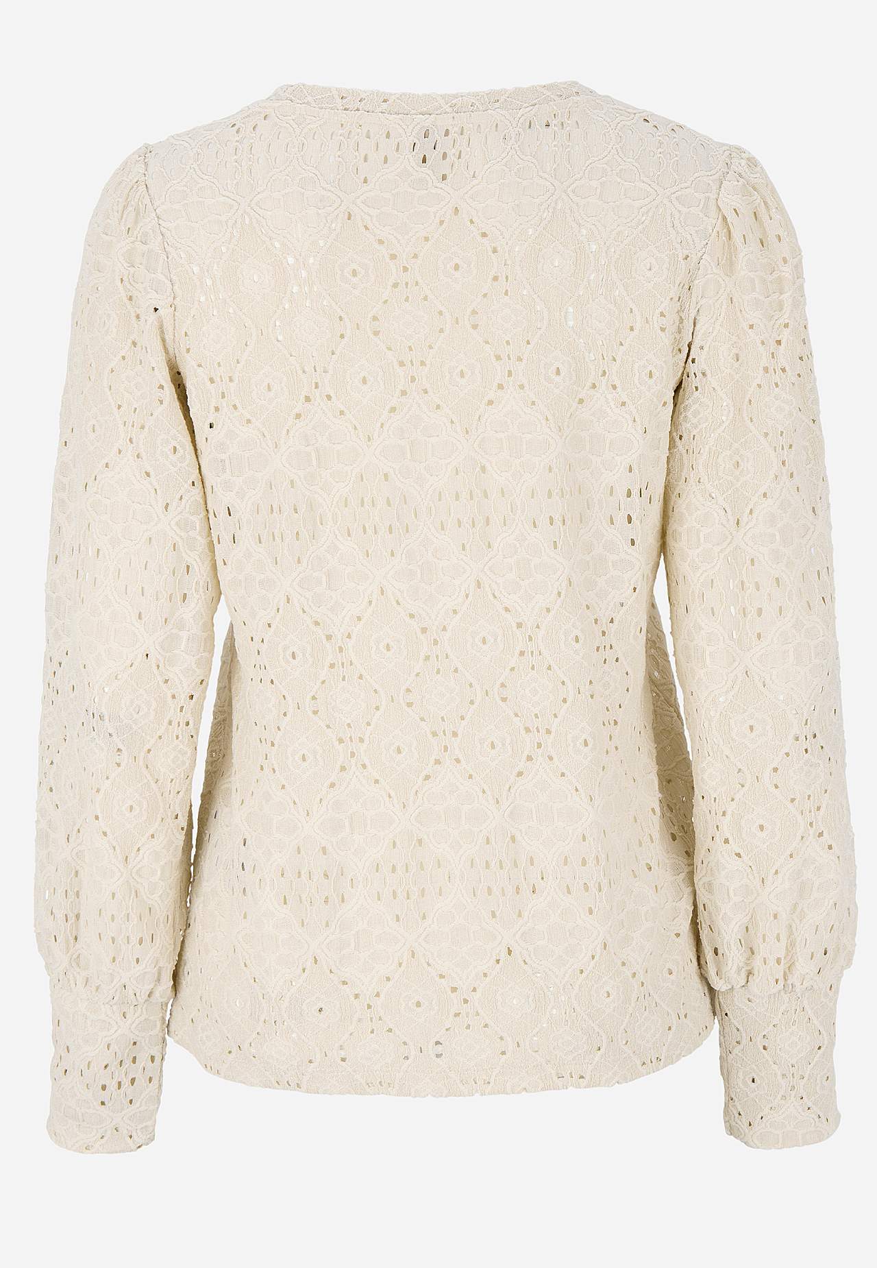 Trikootoppi reikäkirjonnalla