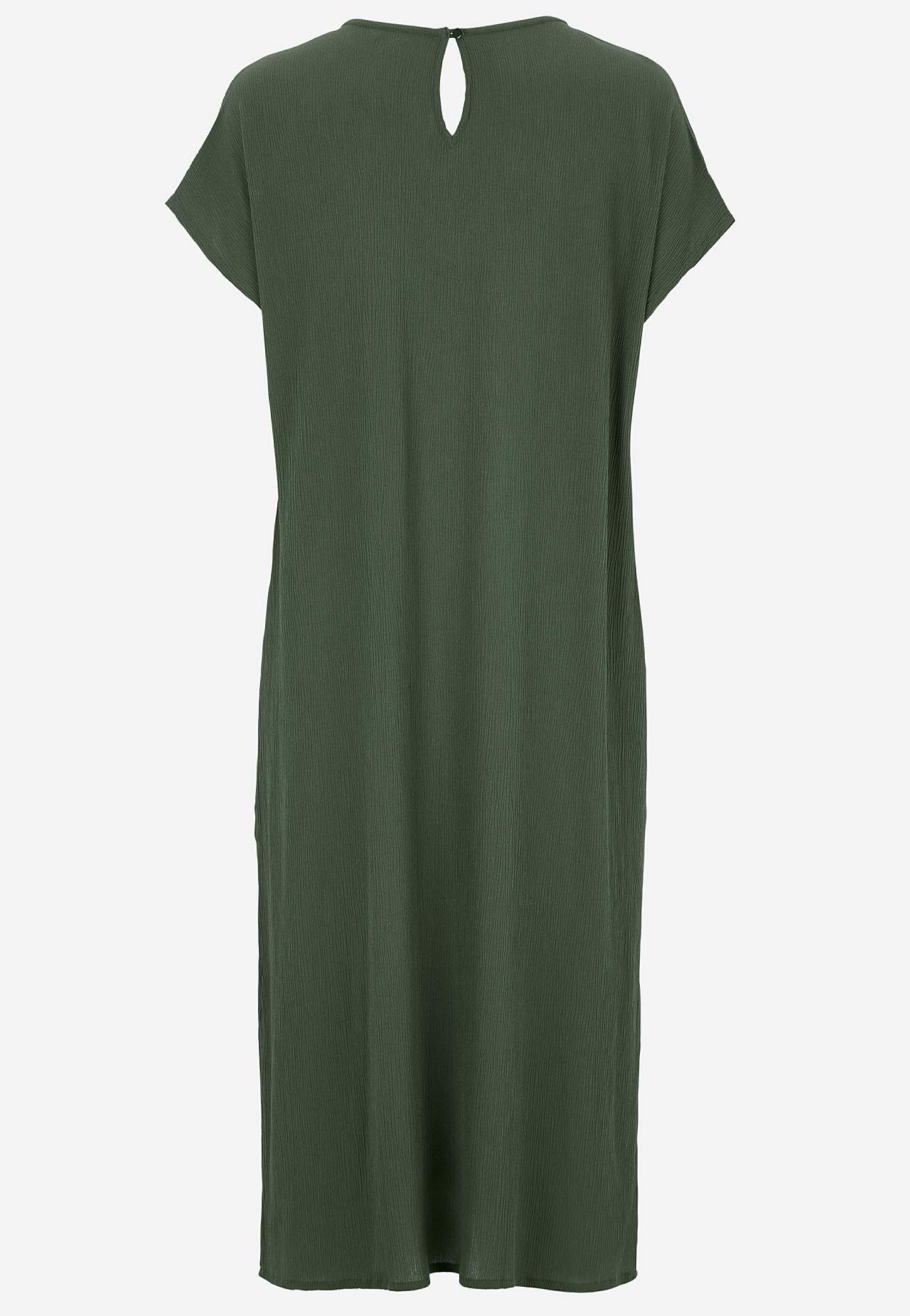 Kreppinen mekko taskuilla