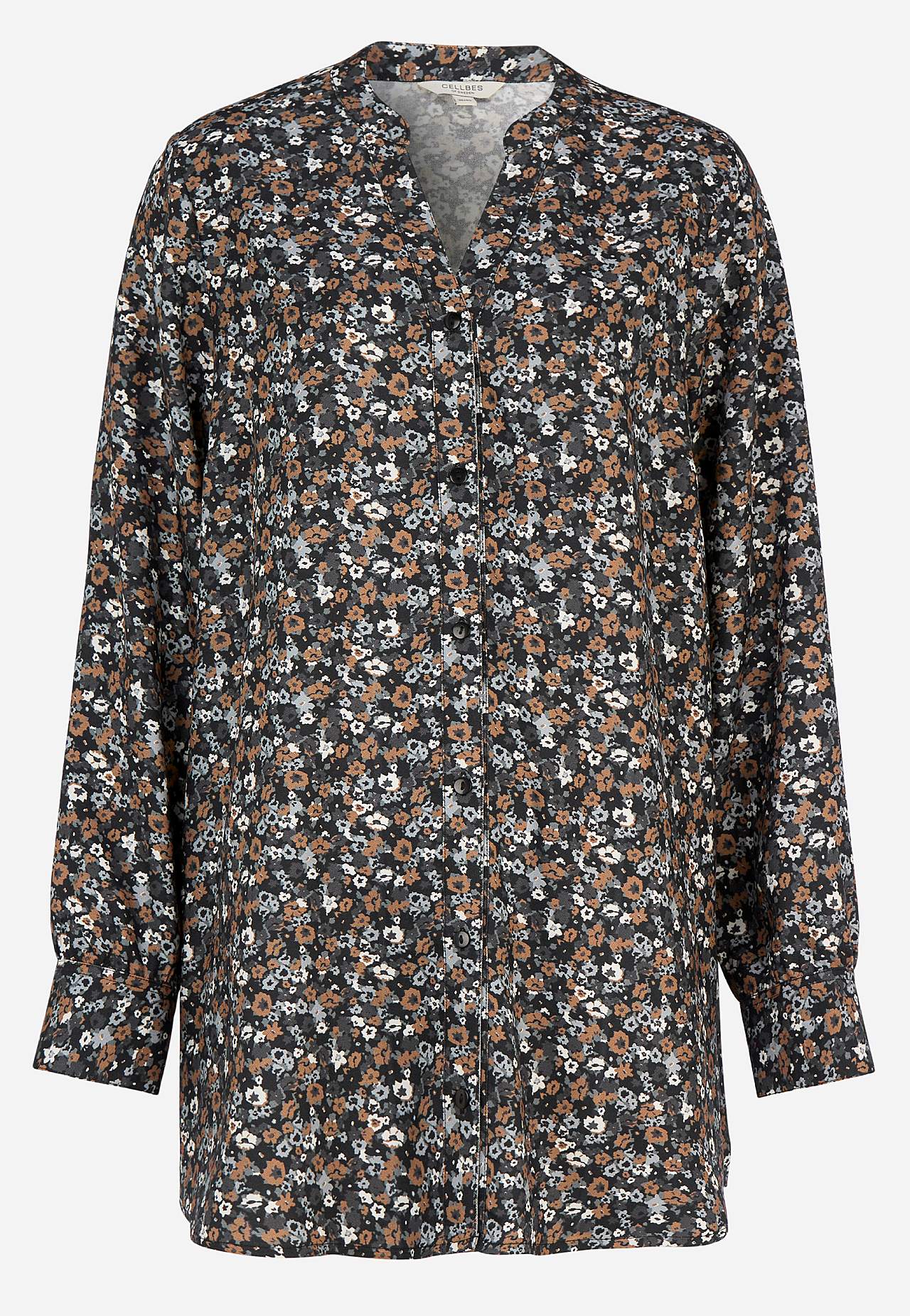 Kudottu tunika napeilla