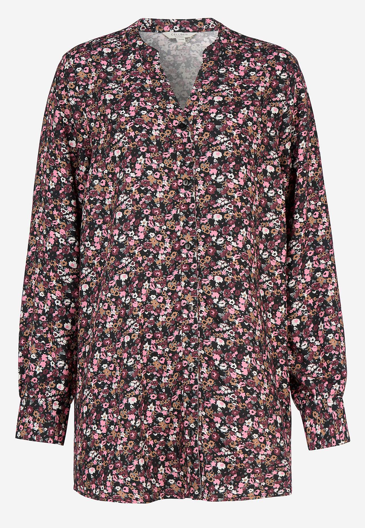 Kudottu tunika napeilla