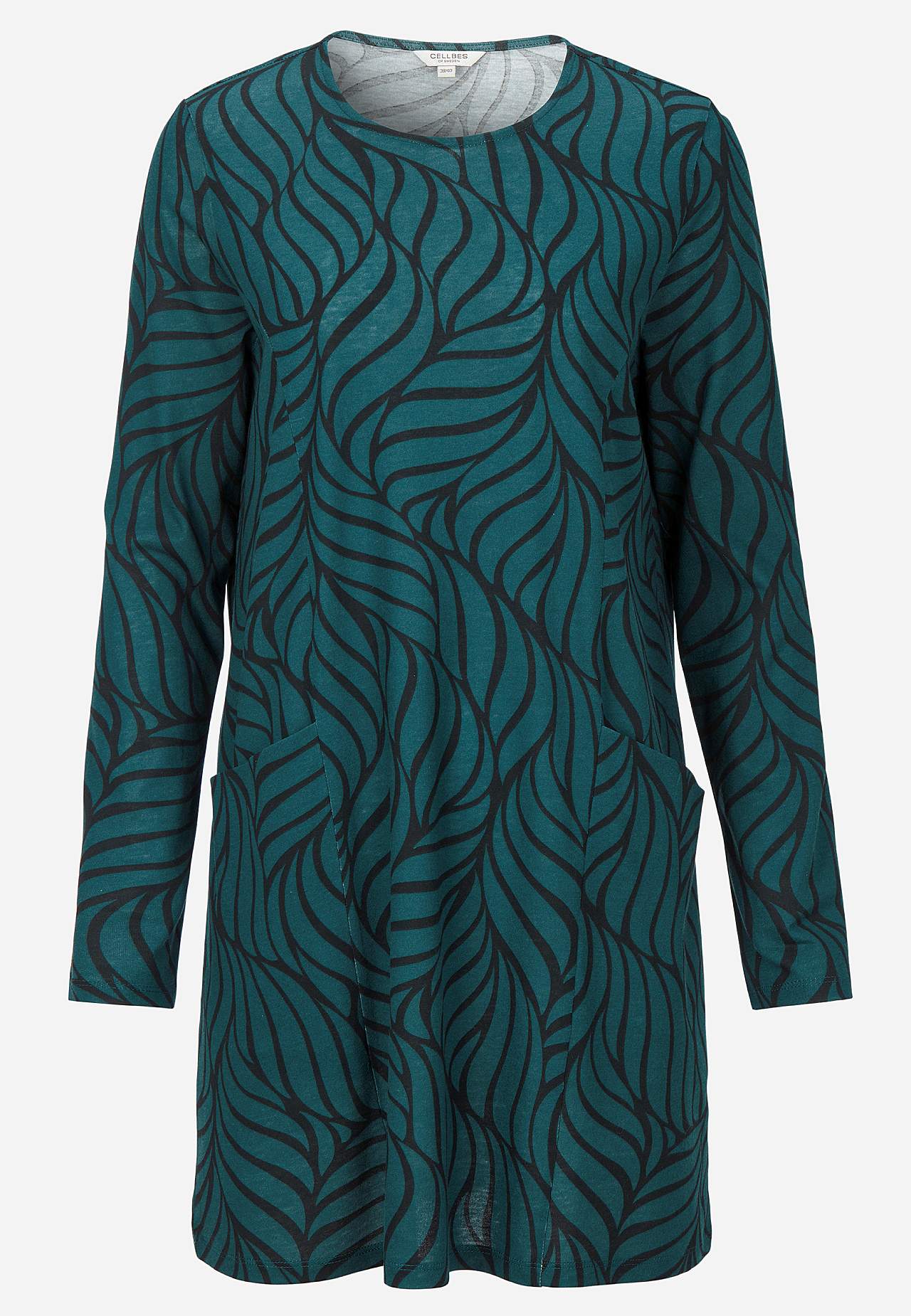 Trikootunika taskuilla