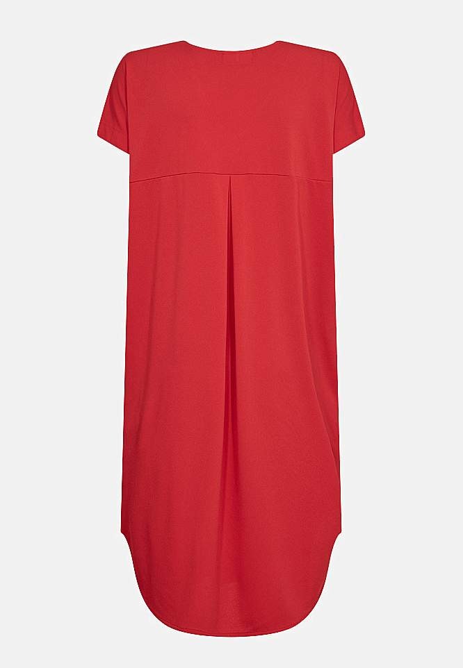 Trikoomekko taskuilla