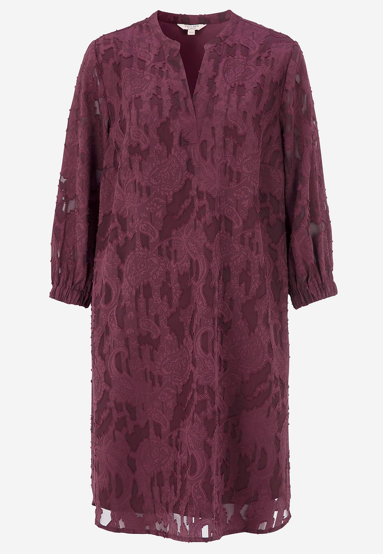 Jacquard-neuloksinen, läpikuultava mekko