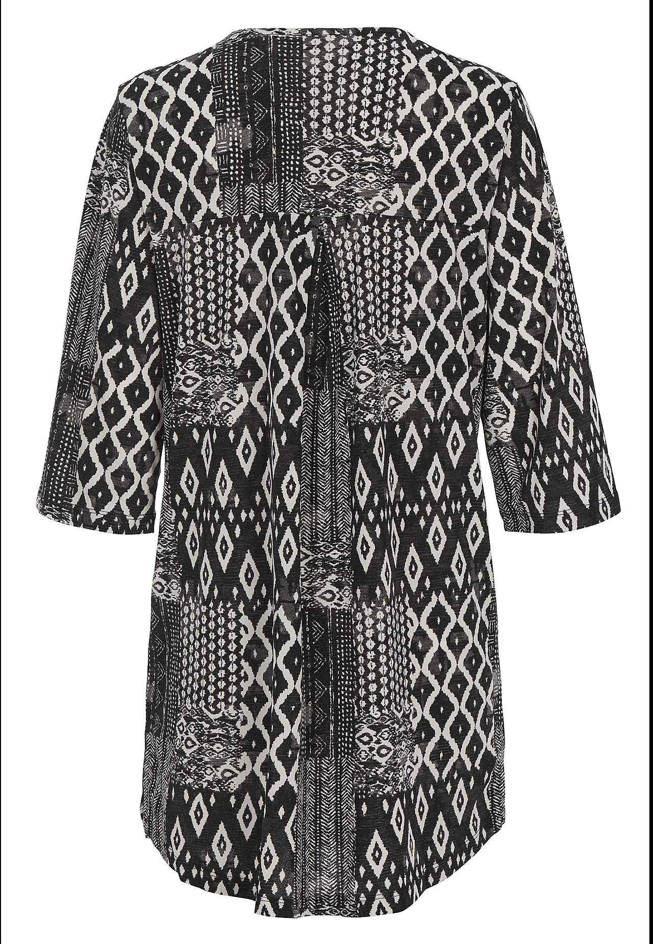 Kuvioitu trikootunika taskuilla